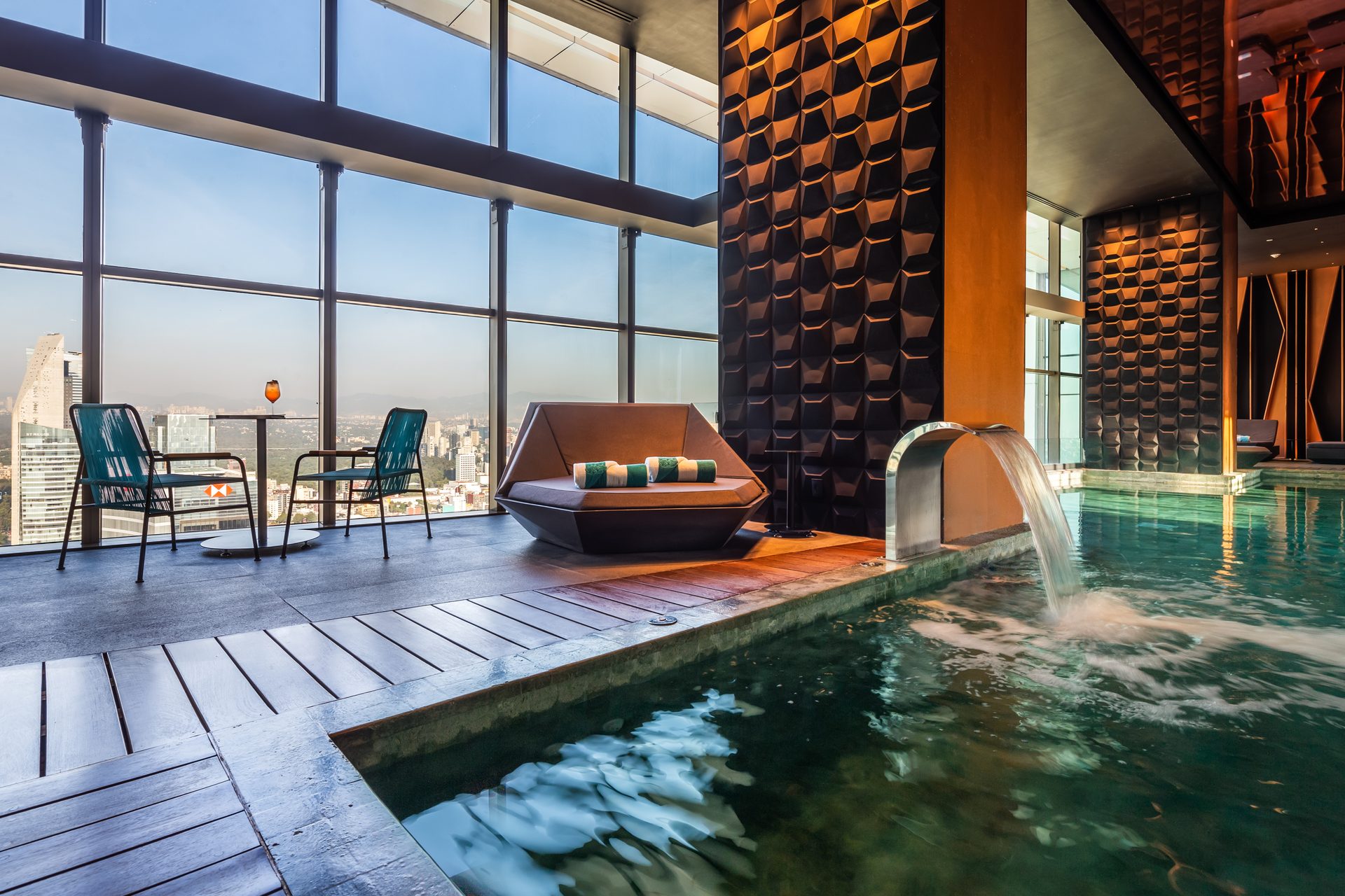 Swimming pool, Interior design, Outdoor furniture, Water, Property, Building, Architecture, Shade, Condominium, House