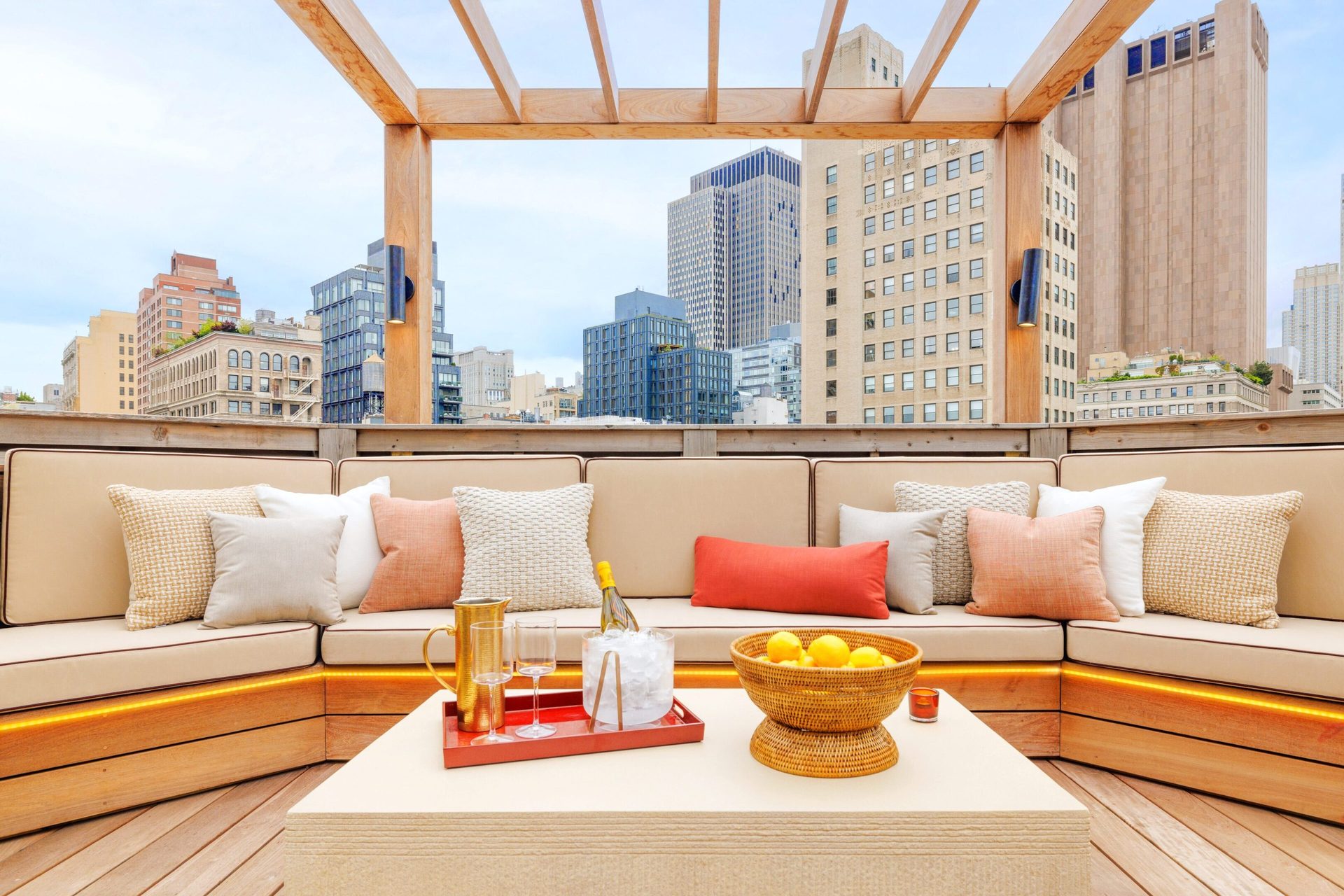 Interior design, Furniture, Sky, Property, Table, Couch, Building, Skyscraper, Wood, Orange