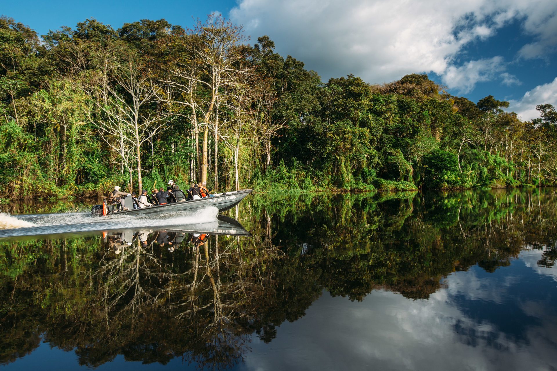 Water resources, Natural landscape, Cloud, Boat, Sky, Plant, Tree, Watercraft, Vegetation