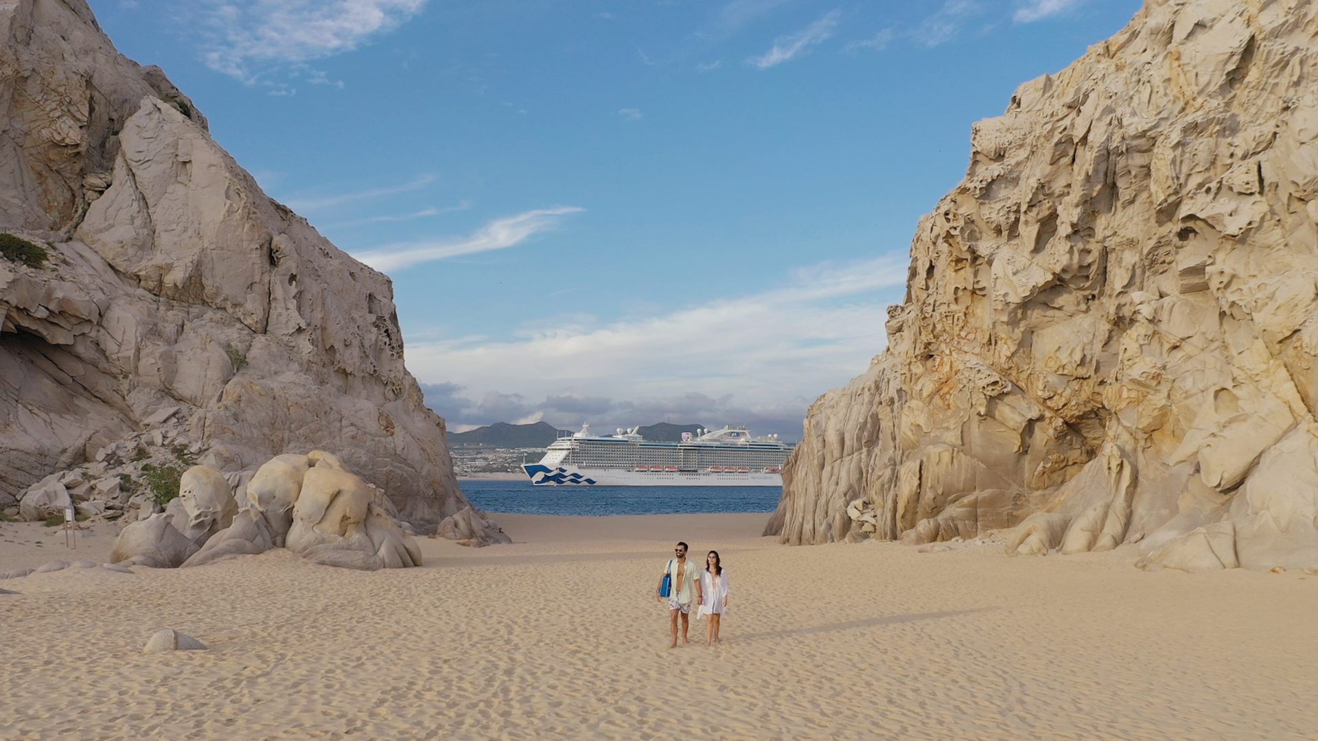 Coastal and oceanic landforms, Body of water, Cloud, Sky, Ecoregion, Azure, Mountain, Bedrock, Terrain, Landscape
