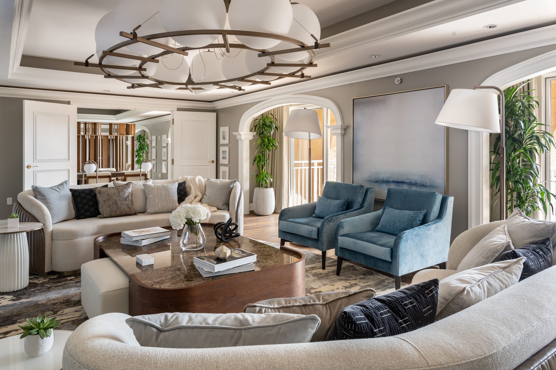 Picture frame, Interior design, Living room, studio couch, Furniture, Table, Floor, Houseplant, Wall