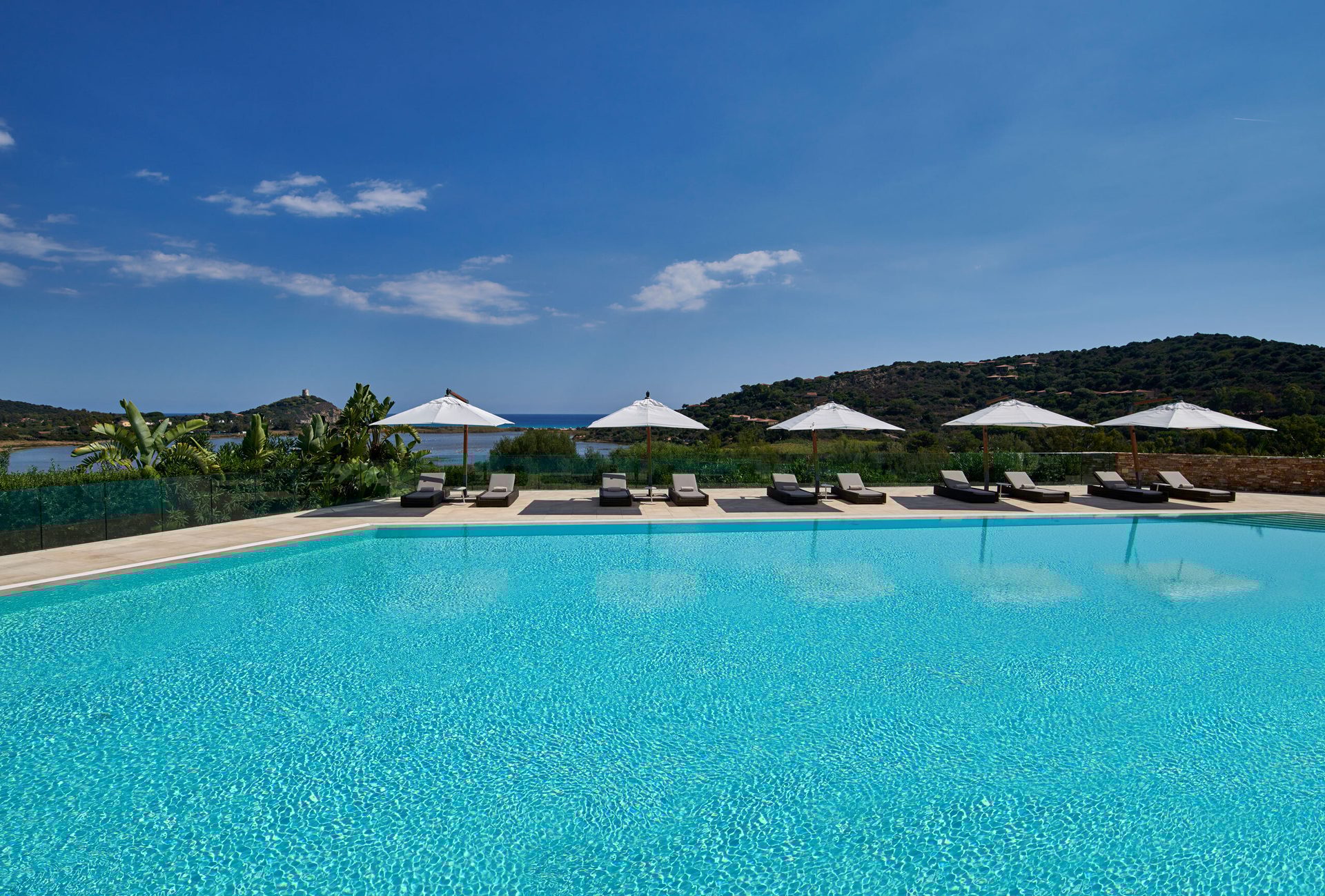 Swimming pool, Outdoor furniture, Water, Sky, Cloud, Plant, Tree, Shade, Leisure, Aqua