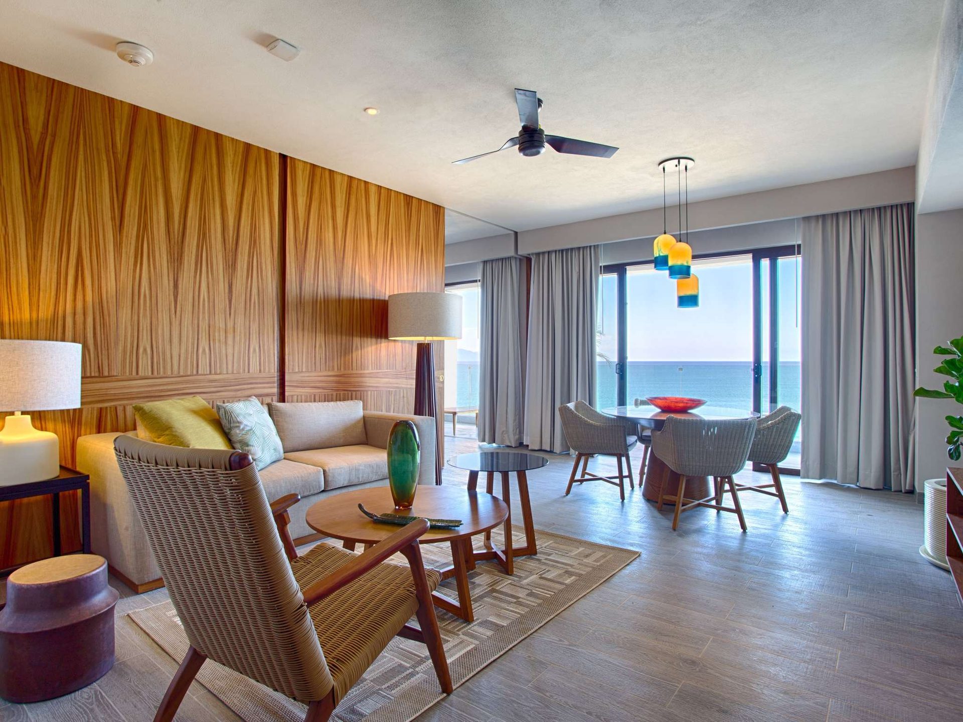 Interior design, Ceiling fan, Property, Furniture, Houseplant, Chair, Plant, Wood, Floor, Flooring