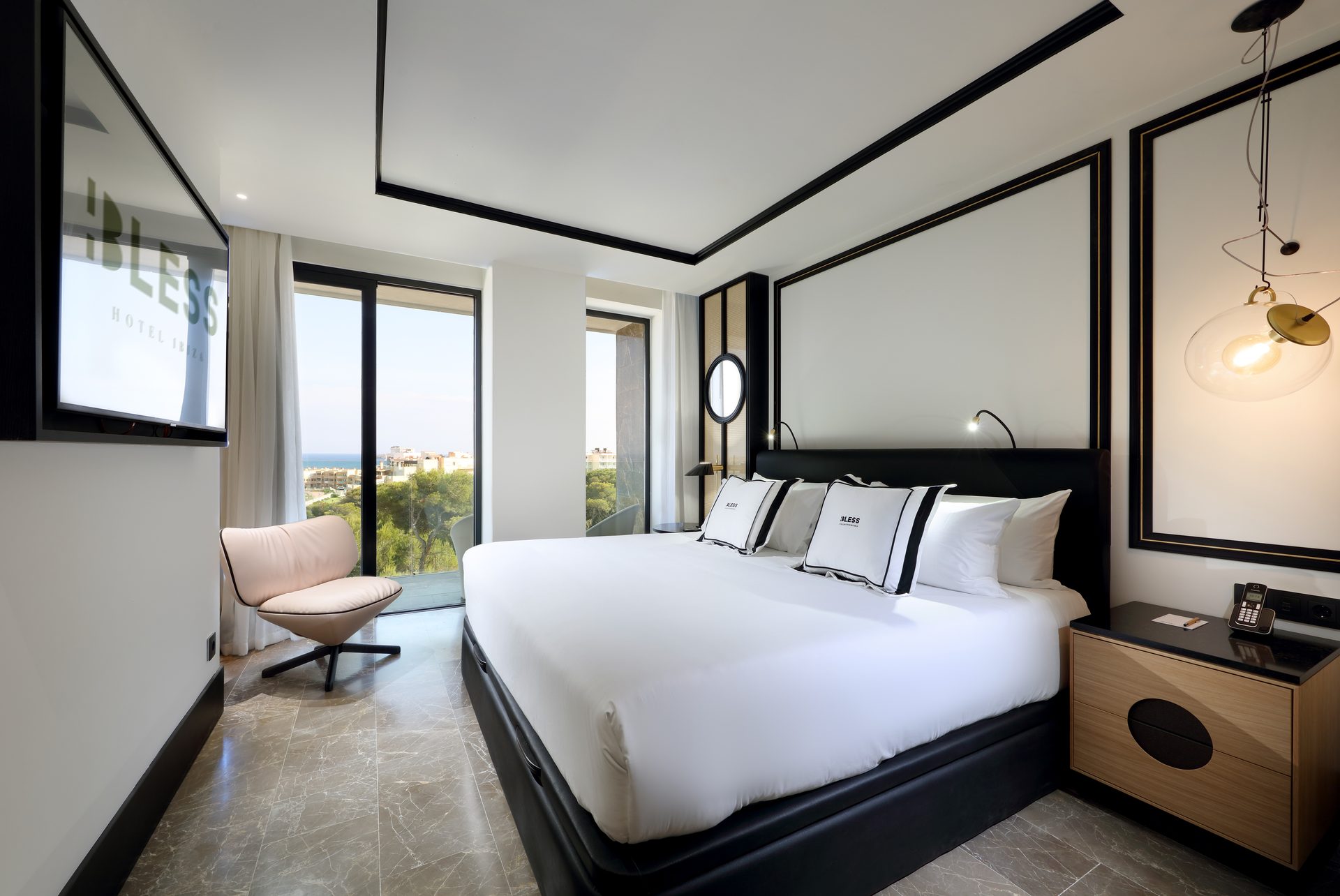Picture frame, Interior design, Furniture, Building, Property, Cabinetry, Comfort, Window, Lighting, Plant