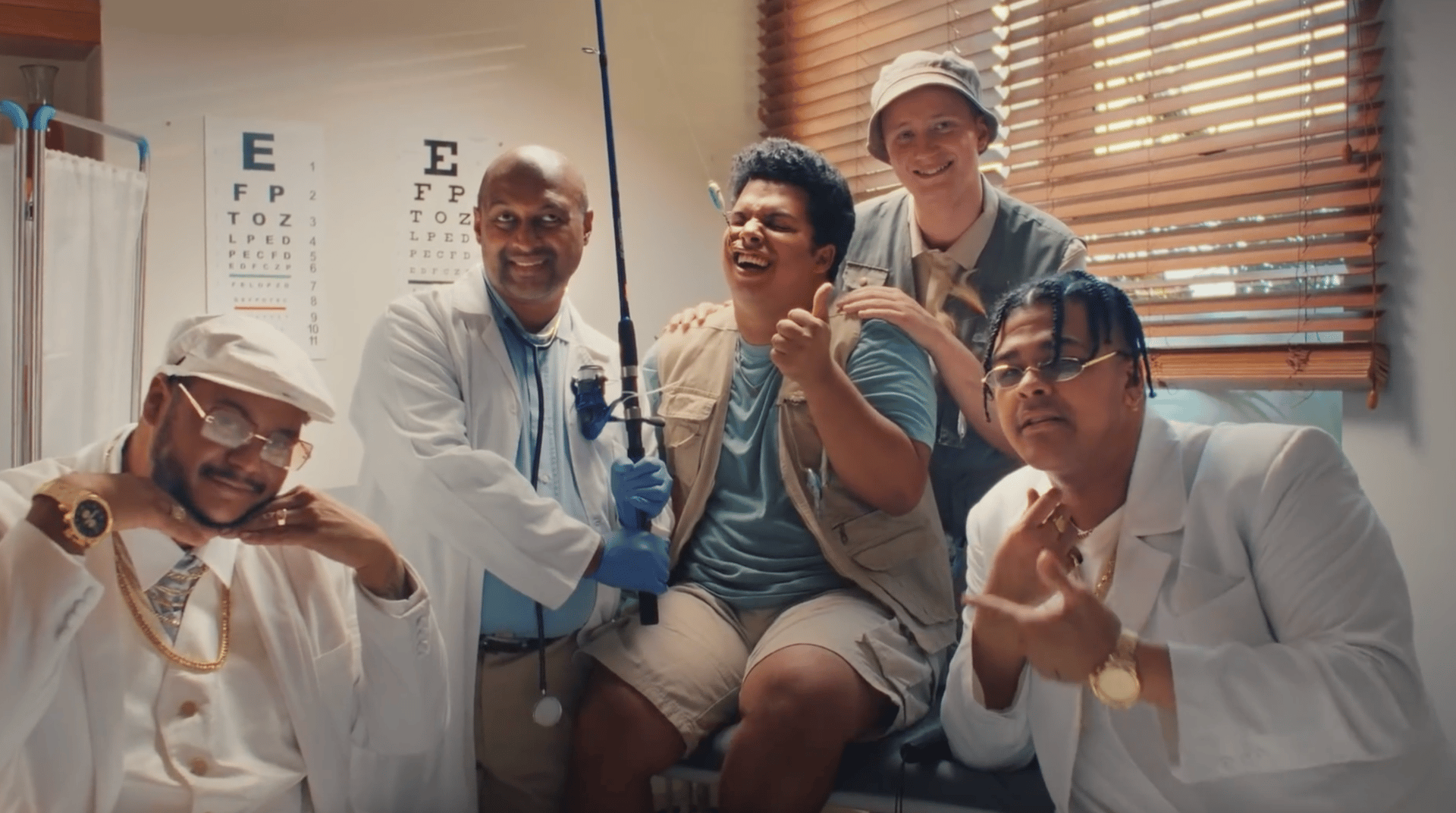 Vision care, Social group, Glasses, Hand, Smile, Shorts, Hat, Eyewear