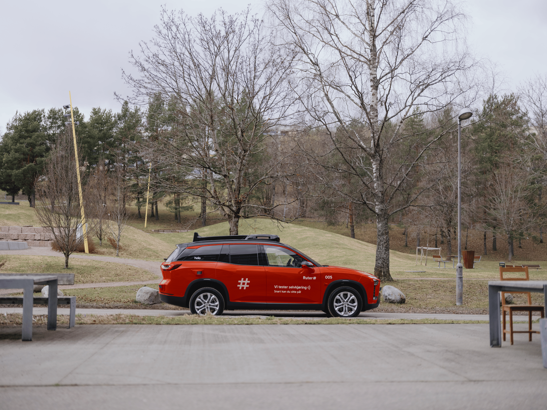 Automotive tail & brake light, Outdoor bench, Car, Wheel, Tire, Vehicle, Sky, Tree, Plant