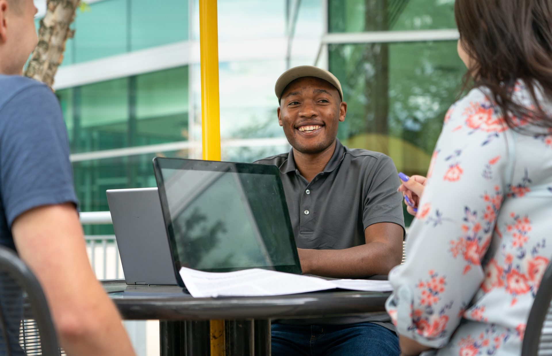 Personal computer, Smile, Table, T-shirt, Leisure, Fun