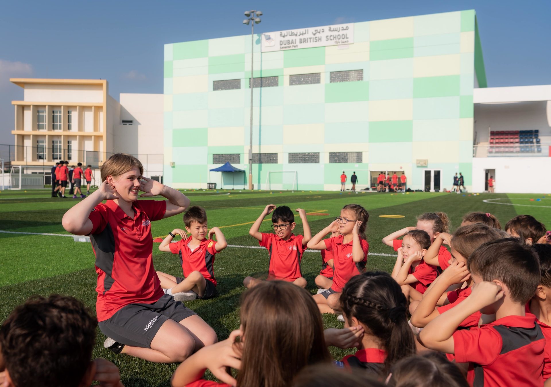 Sky, Building, Shorts, Grass, Community, Leisure