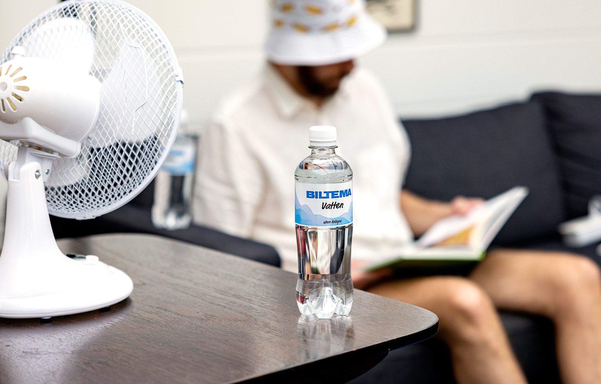 Mineral water, Plastic bottle, Table, Drinkware