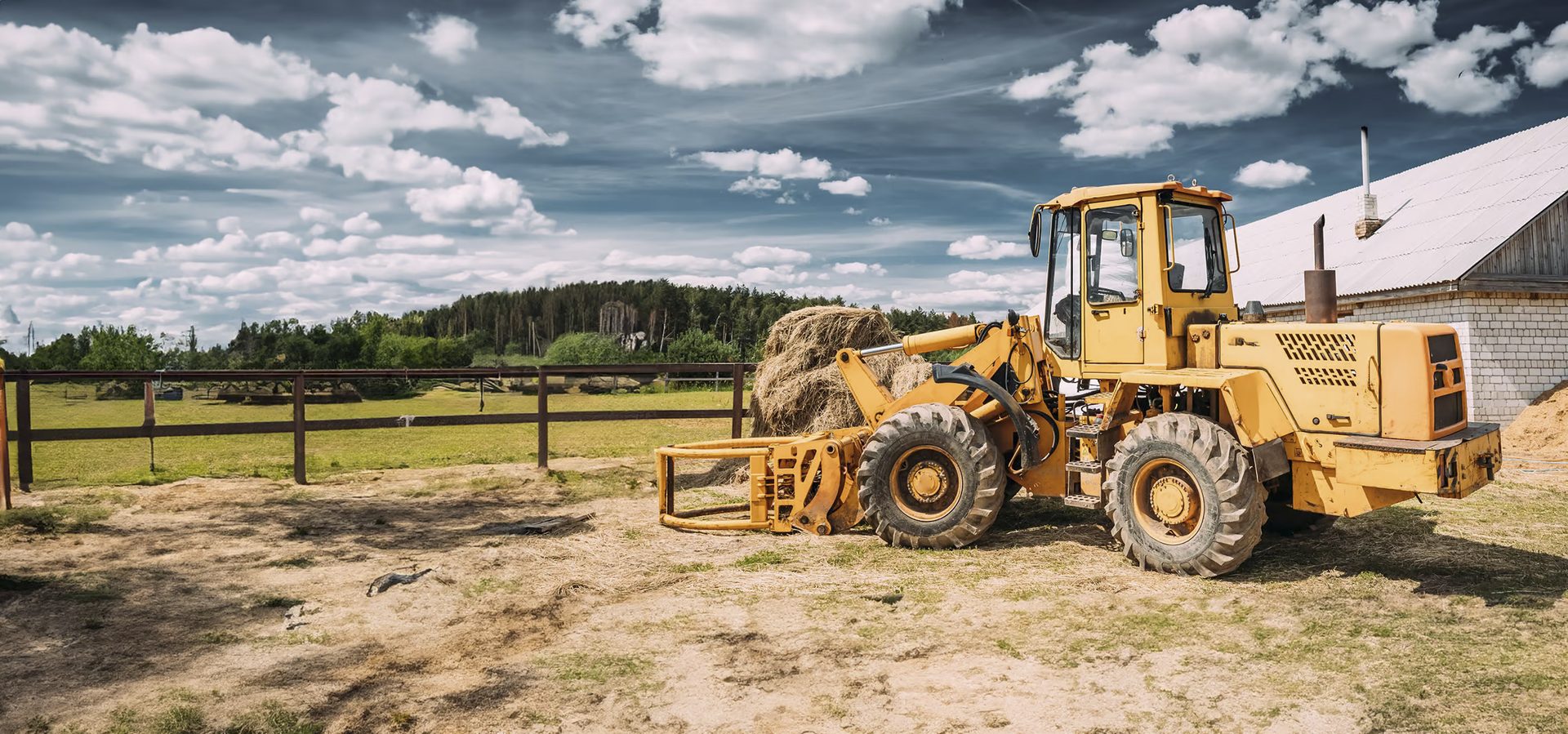 Automotive tire, Cloud, Sky, Wheel, Vehicle, Tractor, Wood, Tree, Plant