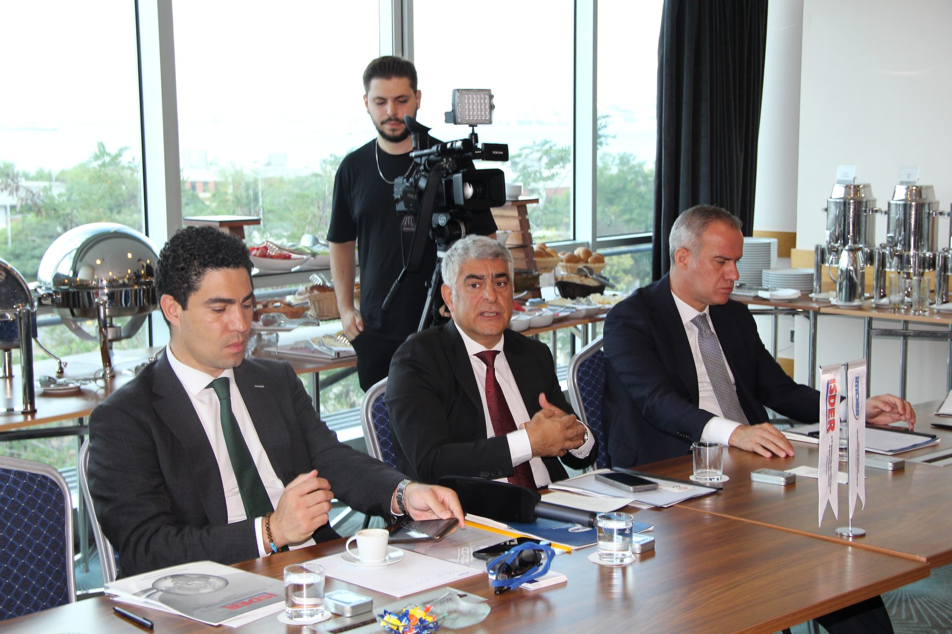 Social group, Table, Furniture, Tie, Chair, Coat, Desk, Suit, Community, Sky