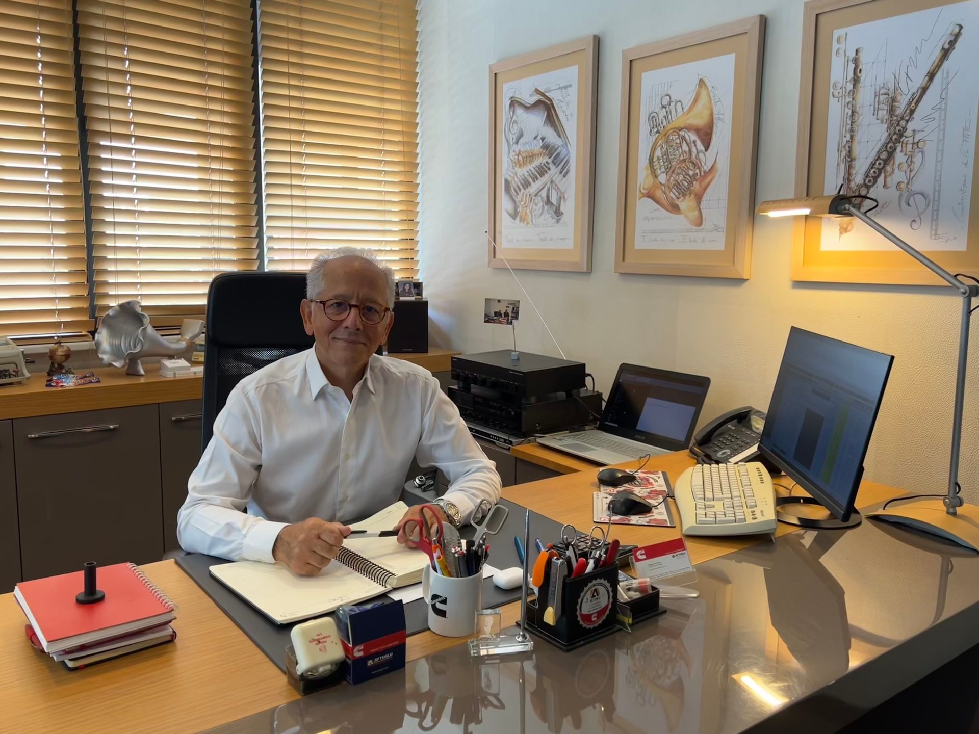 Picture frame, Window blind, Computer monitor, Table, Furniture, Desk, Smile