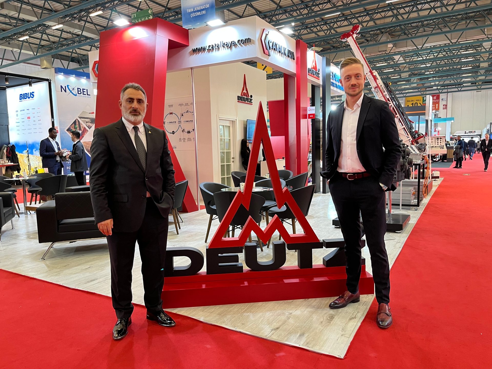 Automotive design, Footwear, Coat, Flooring, Suit, Floor
