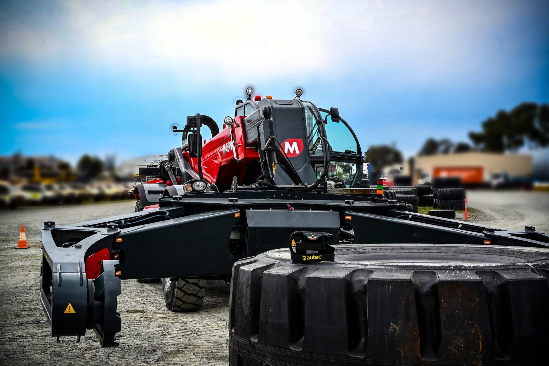 Automotive tire, Motor vehicle, Road surface, Sky, Wheel, Cloud, Asphalt