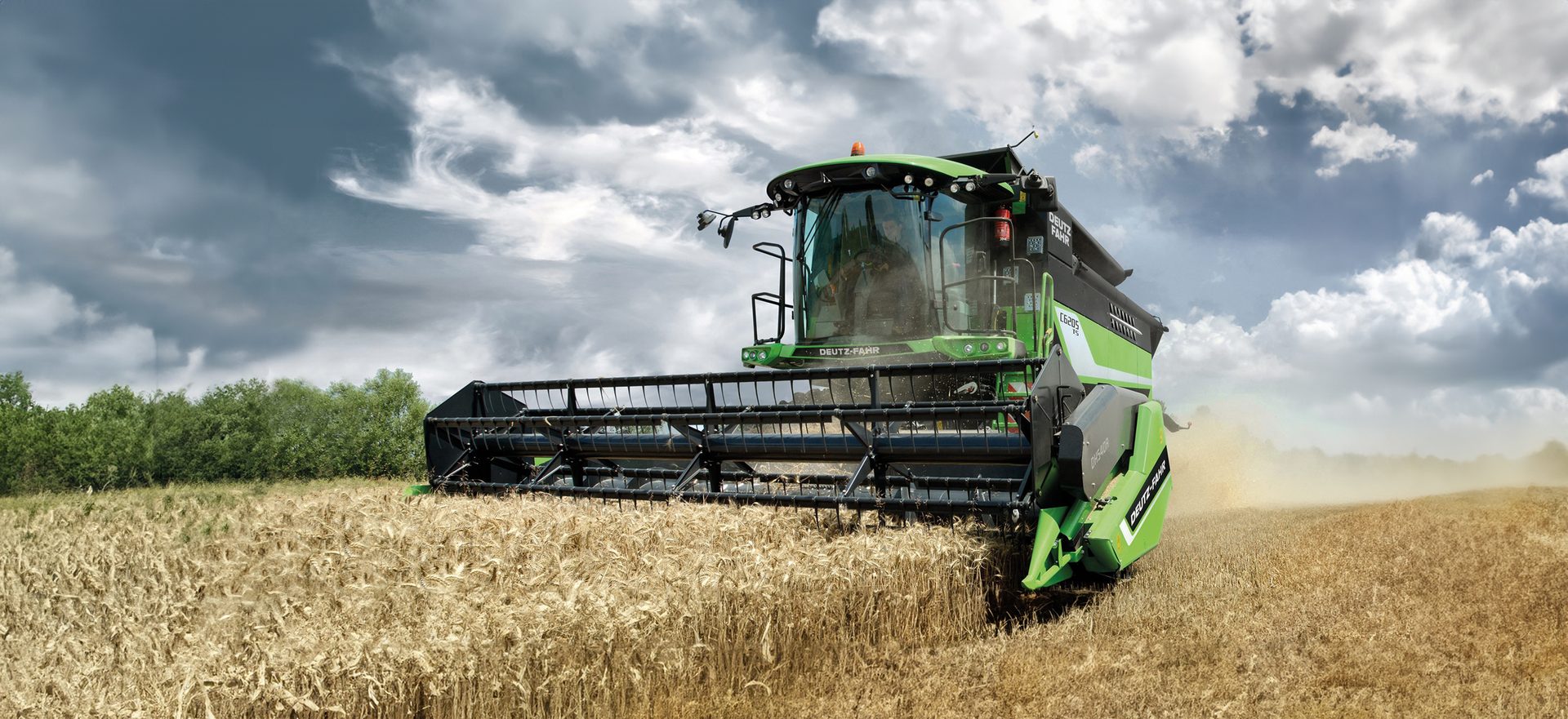 Agricultural machinery, Automotive tire, Cloud, Harvester, Sky, Wheel, Plant, Vehicle, Farmer