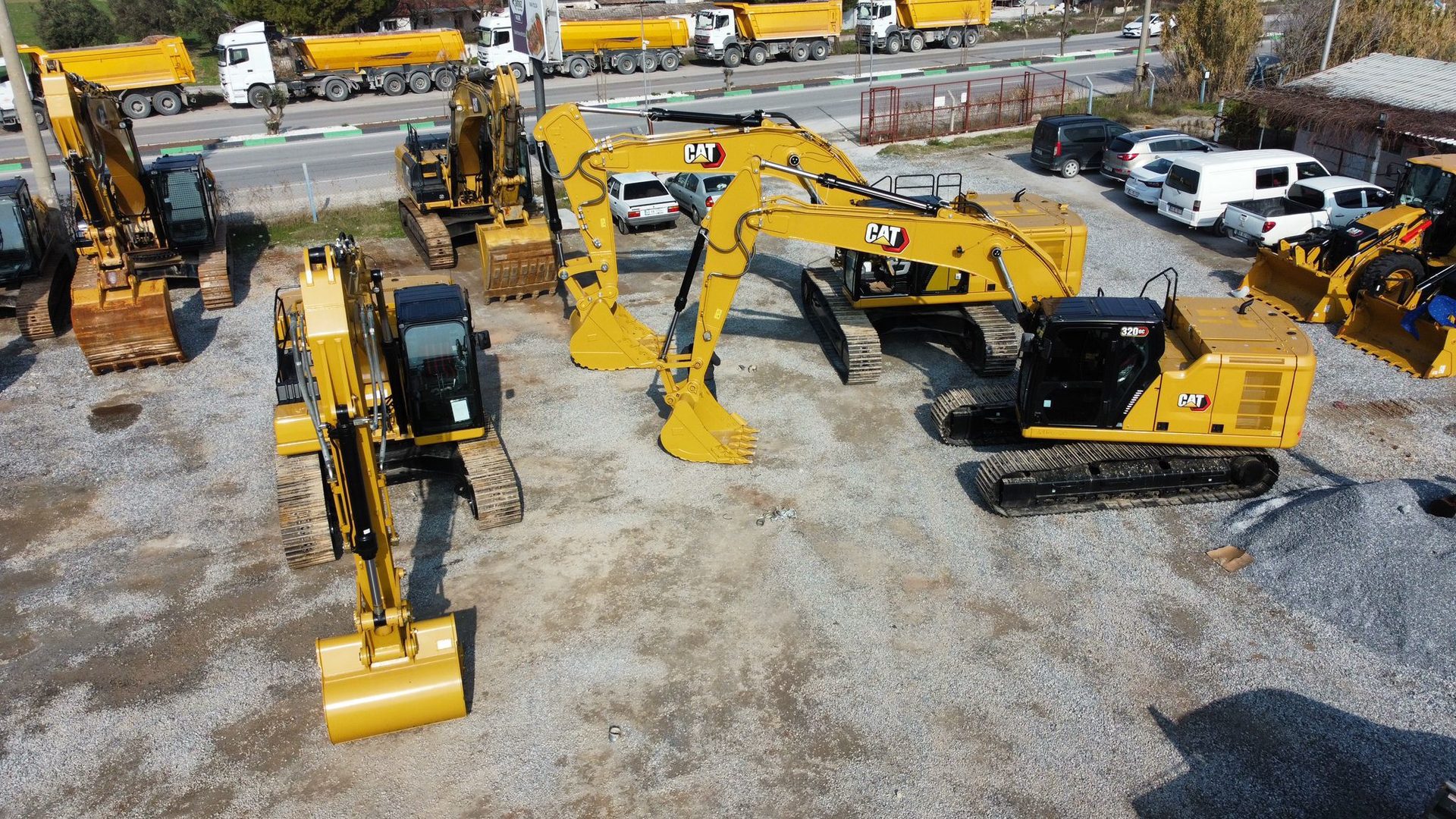 Road surface, Motor vehicle, Yellow, Asphalt, Tree, Bulldozer