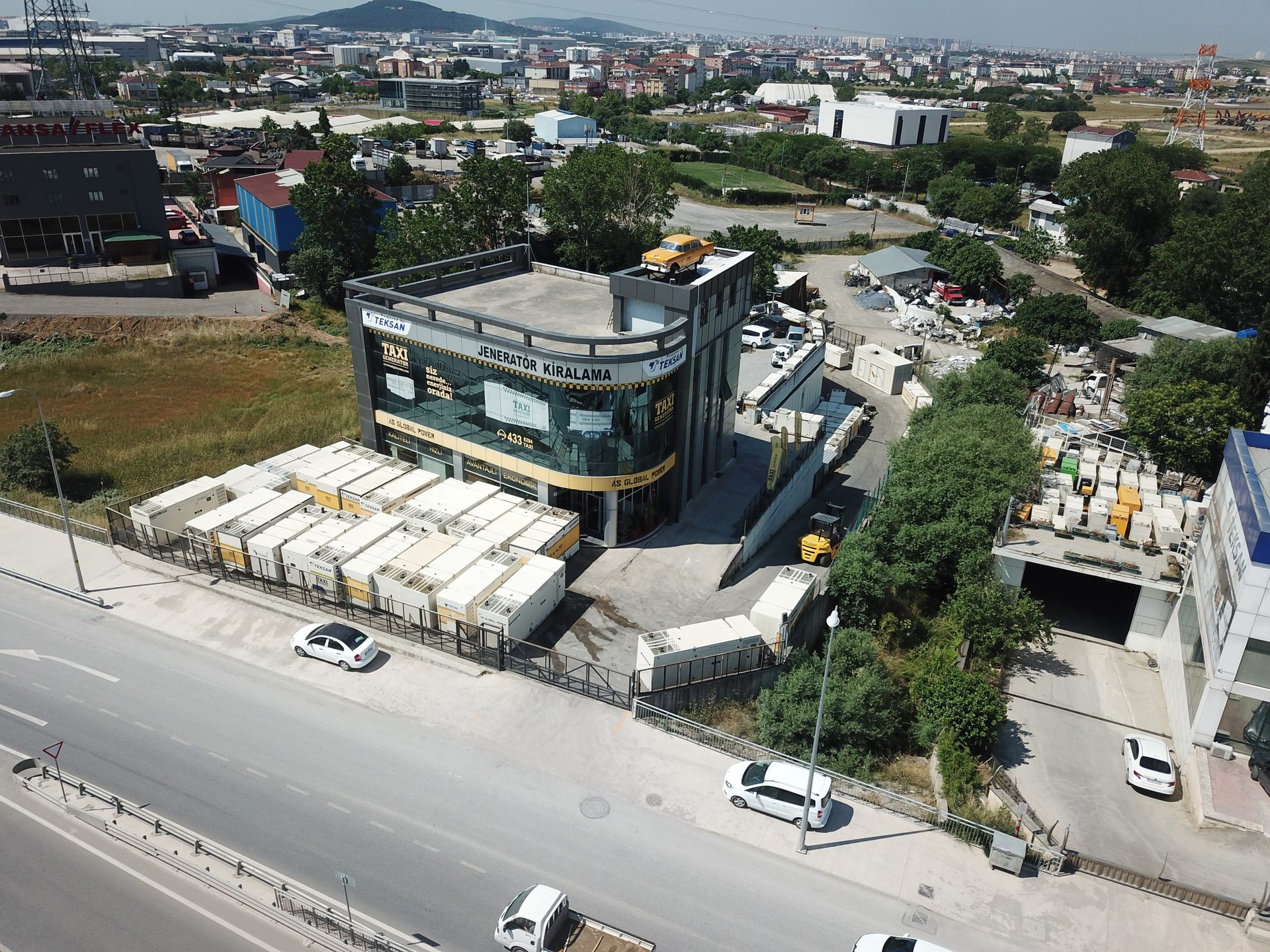 Urban design, Building, Property, Car, Sky, Vehicle, Infrastructure, Window, Tree, Architecture