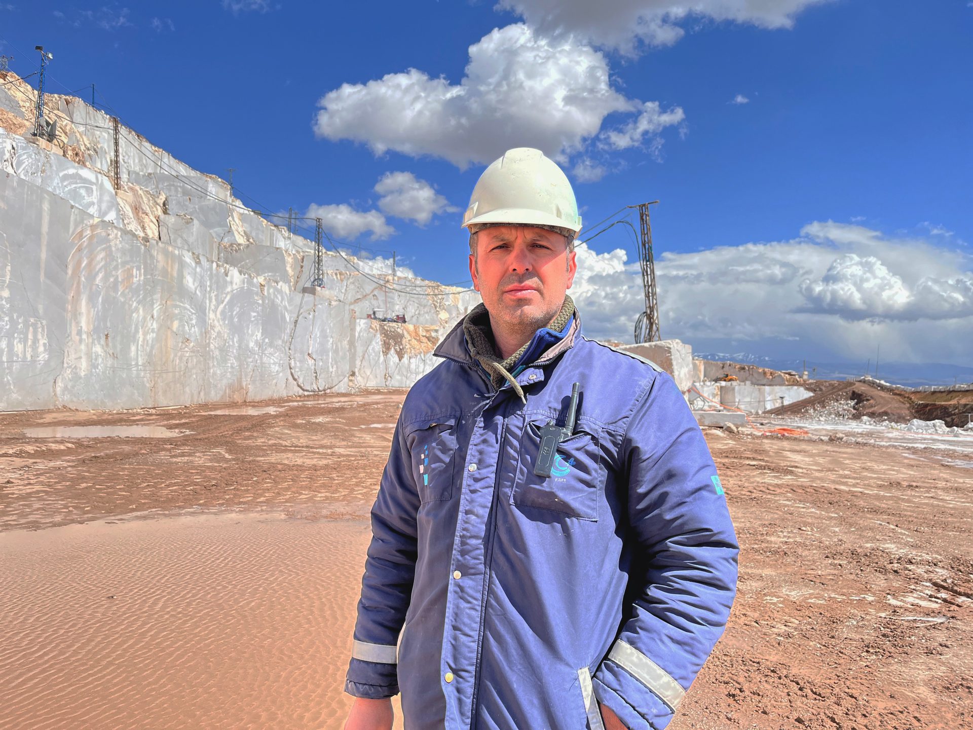 Hard hat, Cloud, Sky, Helmet, Sleeve, Travel