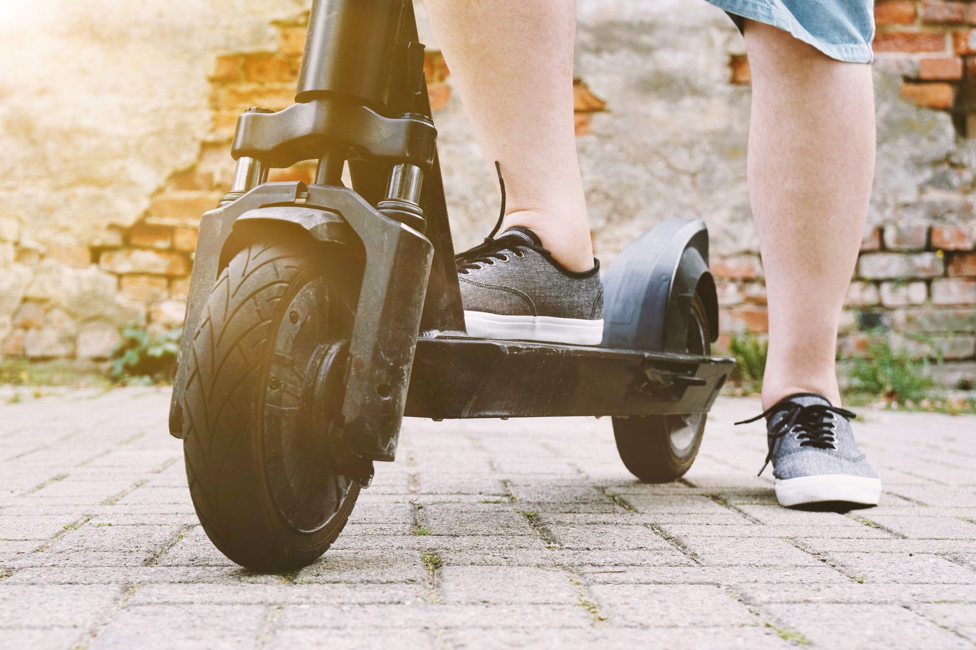 Automotive tire, Footwear, Wheel, Shoe, Leg, Tread, Vehicle, Shorts
