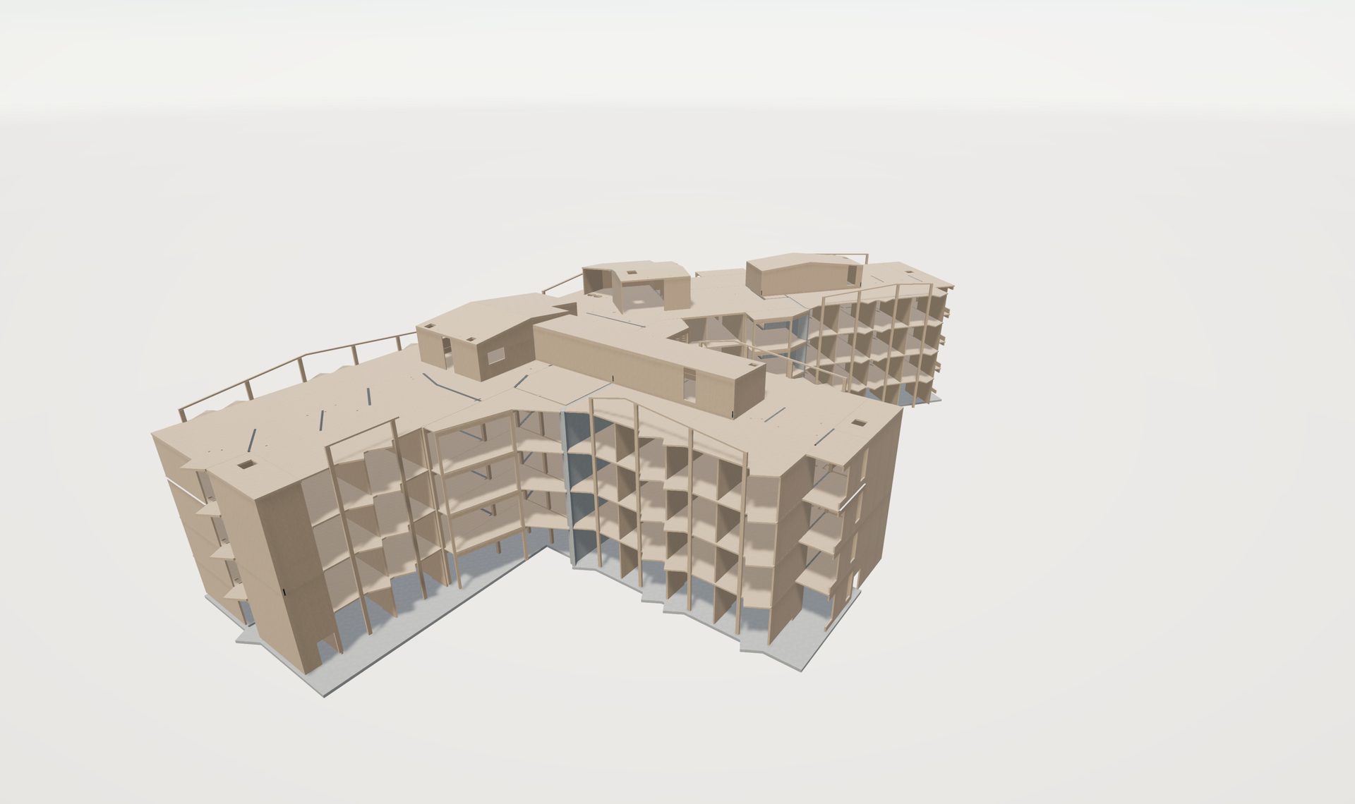 A beige 3D model of a multi-story building with exposed internal structures, viewed from above.