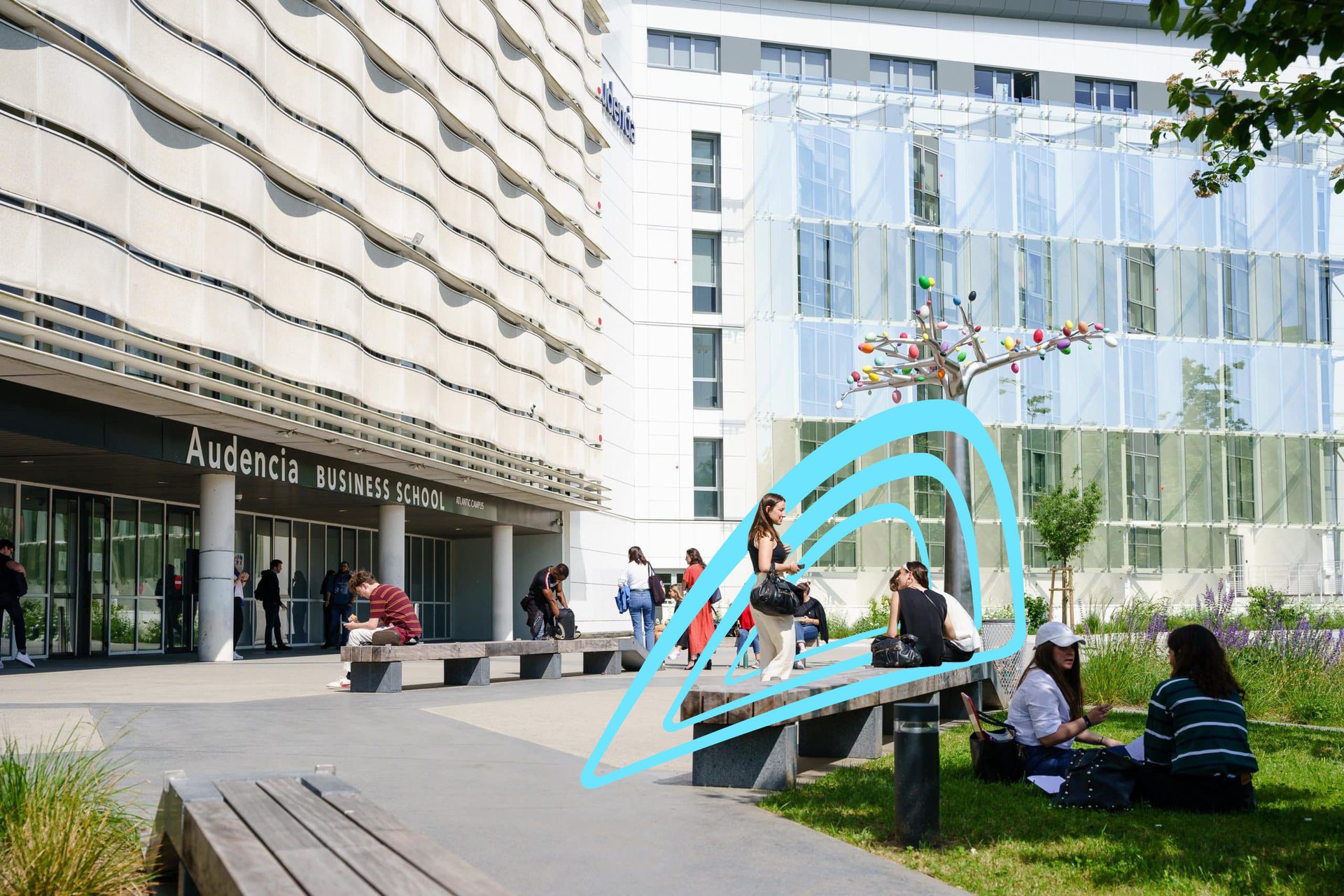 Students relax on benches and grass outside the modern Audencia Business School building.