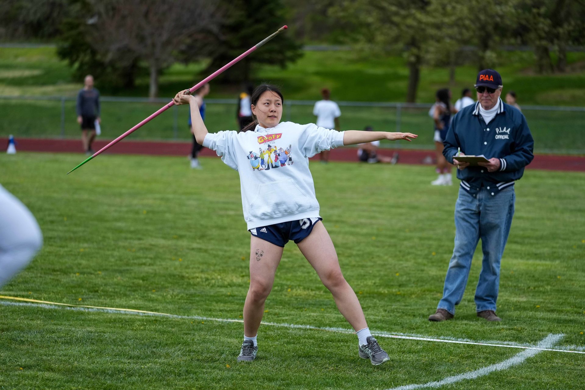Track and field athletics, Javelin throw, Sports equipment, Pole vault, Baseball bat, Shorts, Player, Plant, Grass