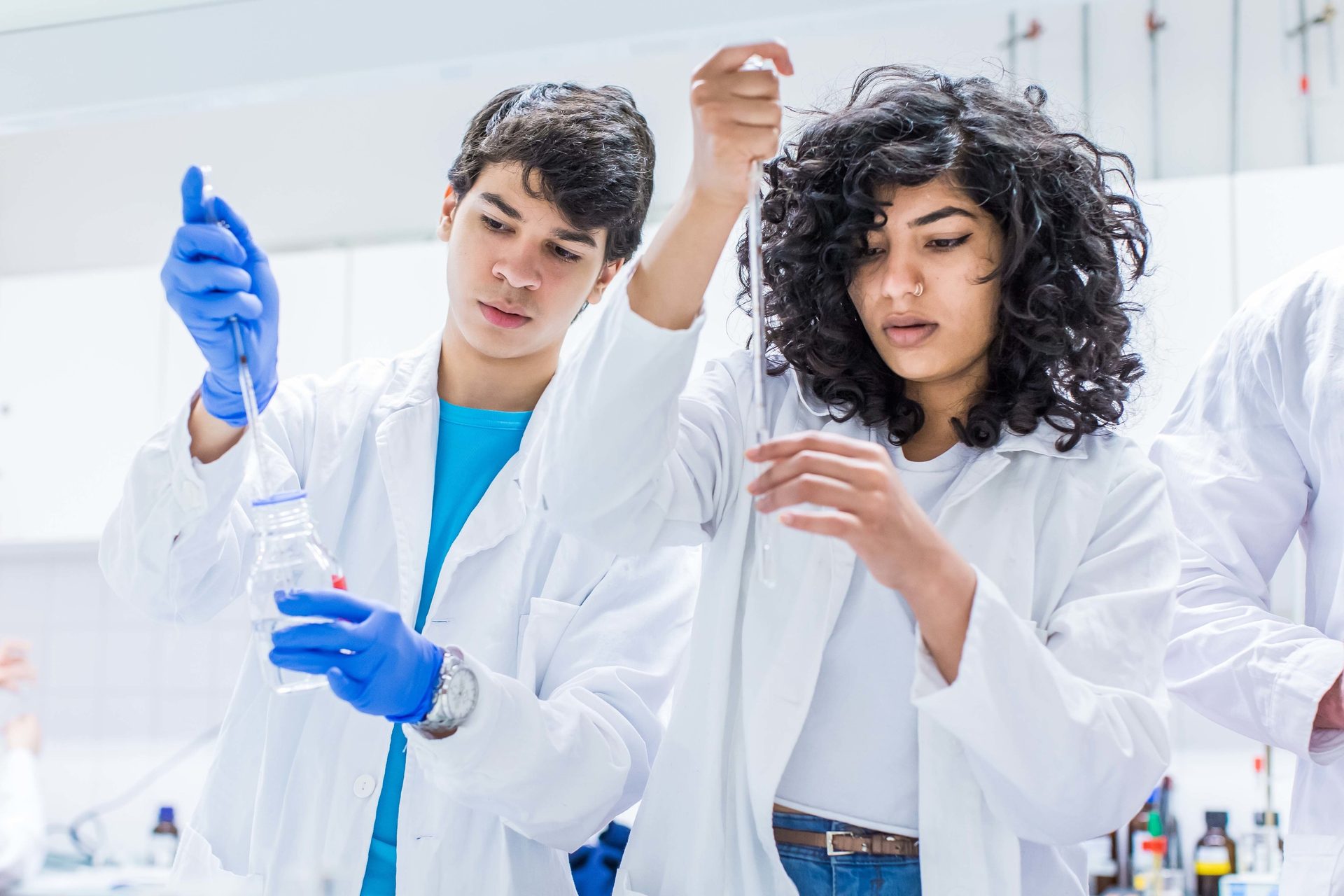 White coat, Hairstyle, Glove, Sleeve, Happy, Gesture