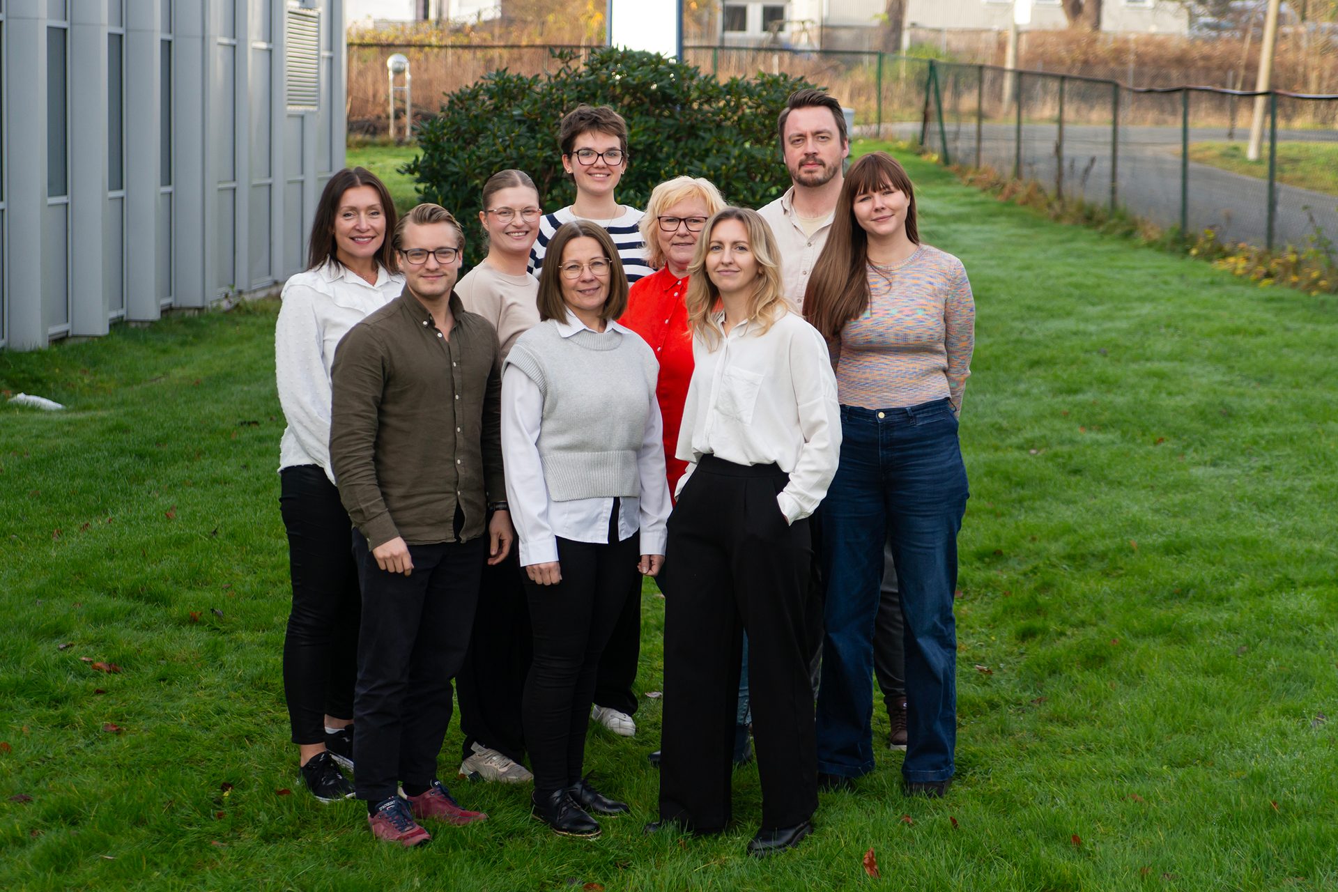 Social group, People, Smile, Sleeve, Happiness, Trousers, Standing, Community, Jeans, Denim