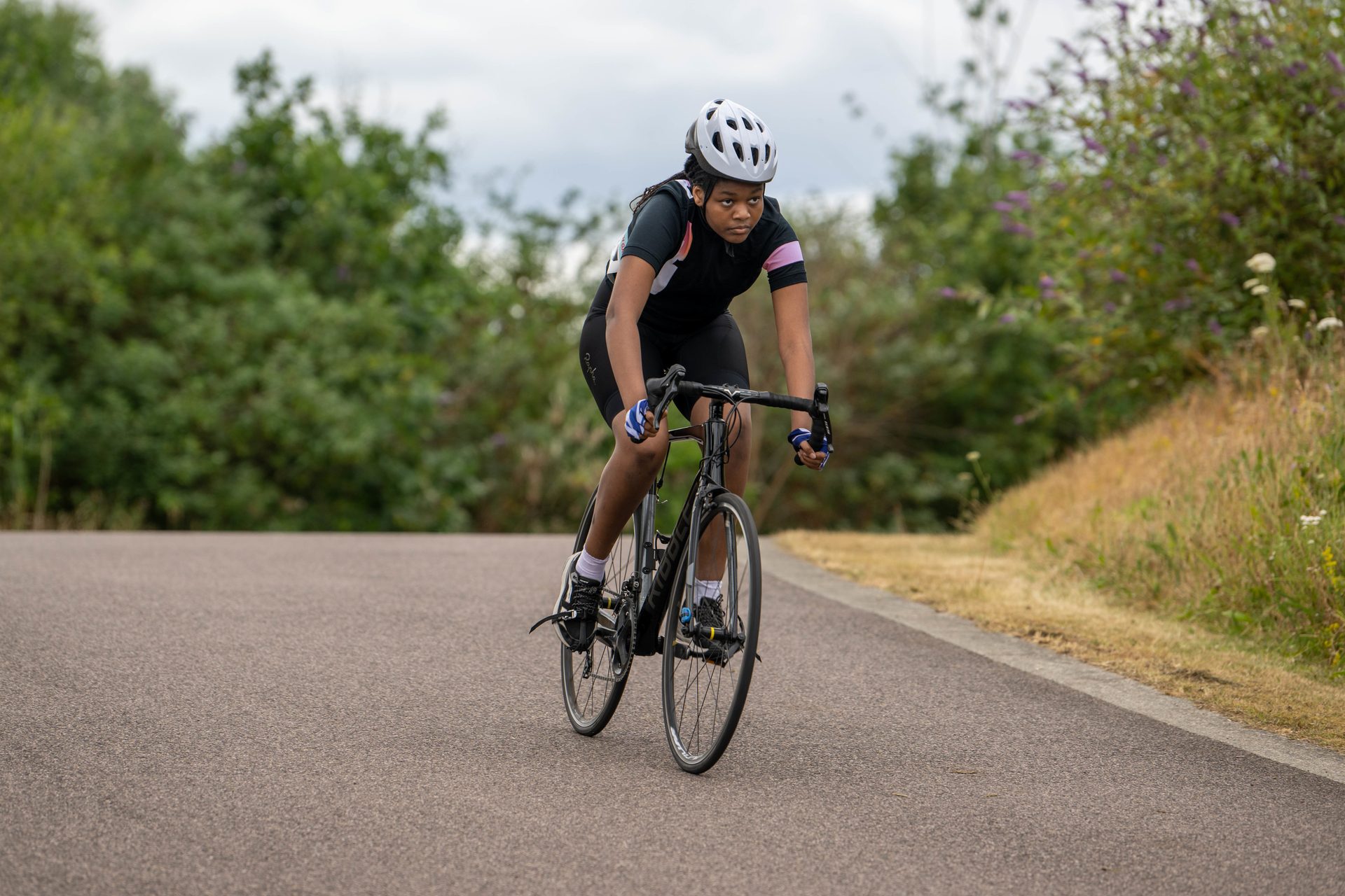 Black girl riding a bike