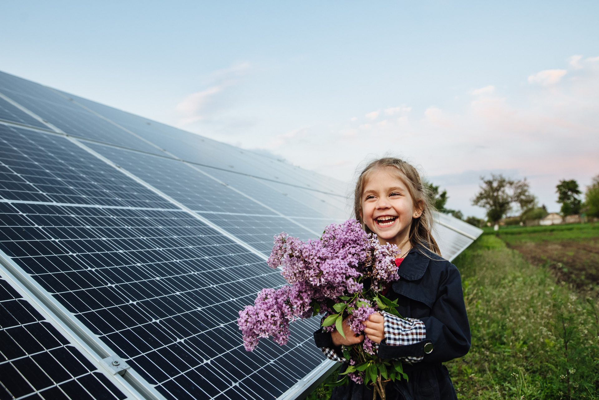 People in nature, Natural environment, Solar panel, Sky, Smile, Cloud, Flower, Plant, Tree