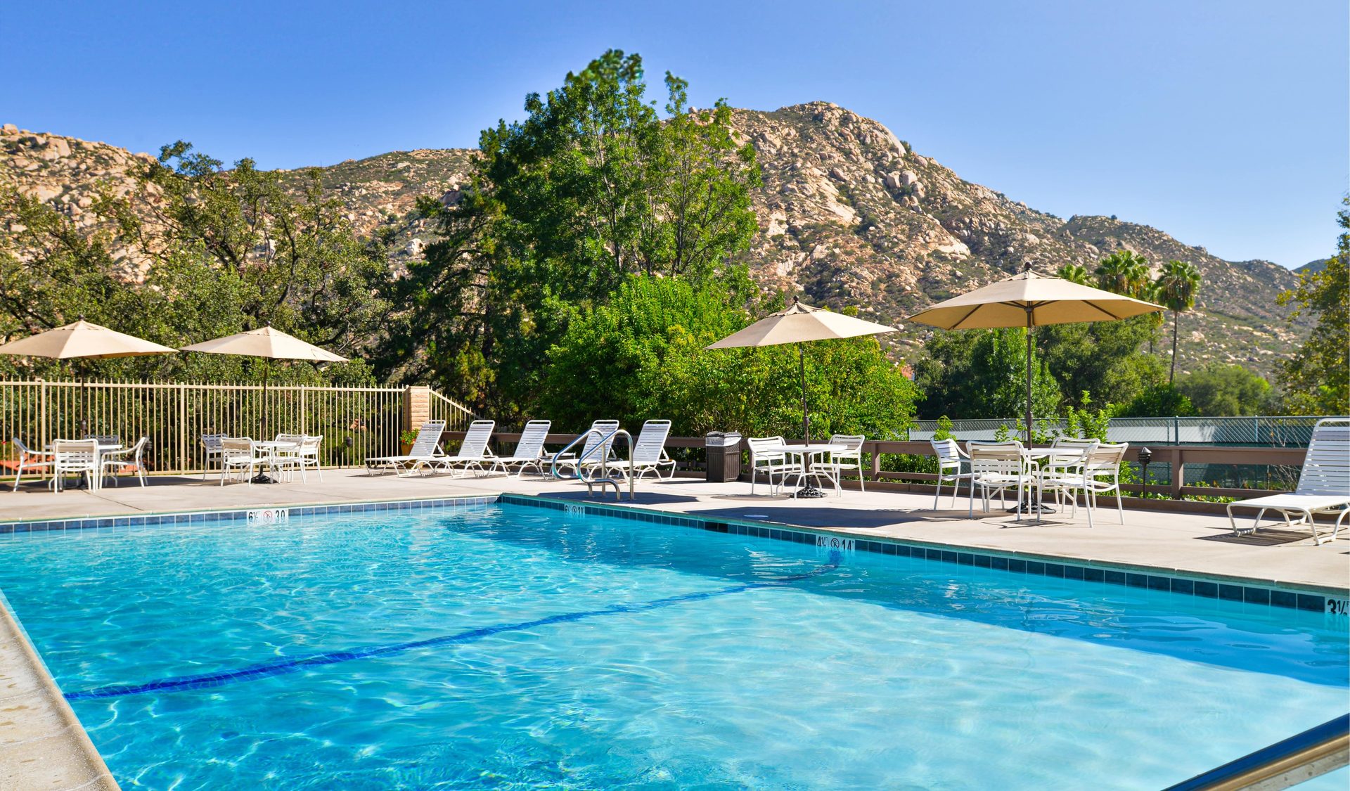 Mountainous landforms, Mountain range, Swimming pool, Outdoor furniture, Hill, Resort
