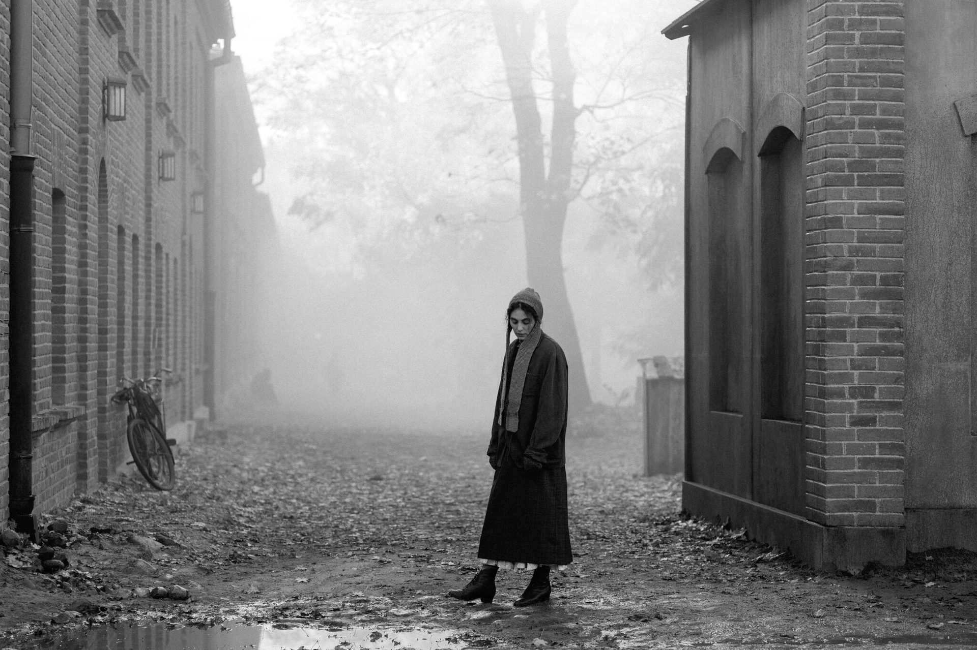 atmospheric phenomenon, Monochrome photography, Photograph, Outerwear, Standing, Mist, Overcoat, Fog, Haze