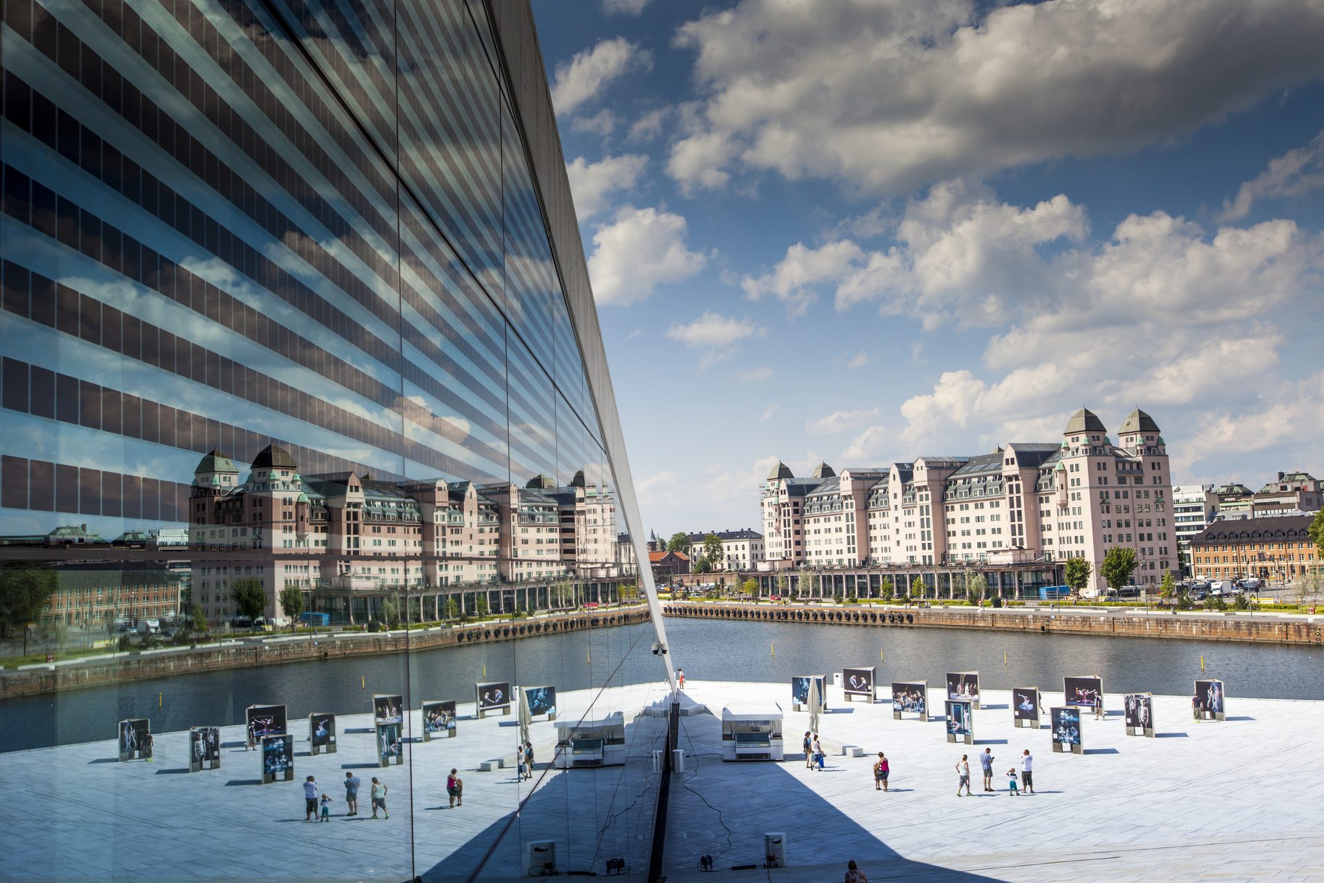 Body of water, Urban design, Tower block, Cloud, Sky, Building, Daytime, Bridge
