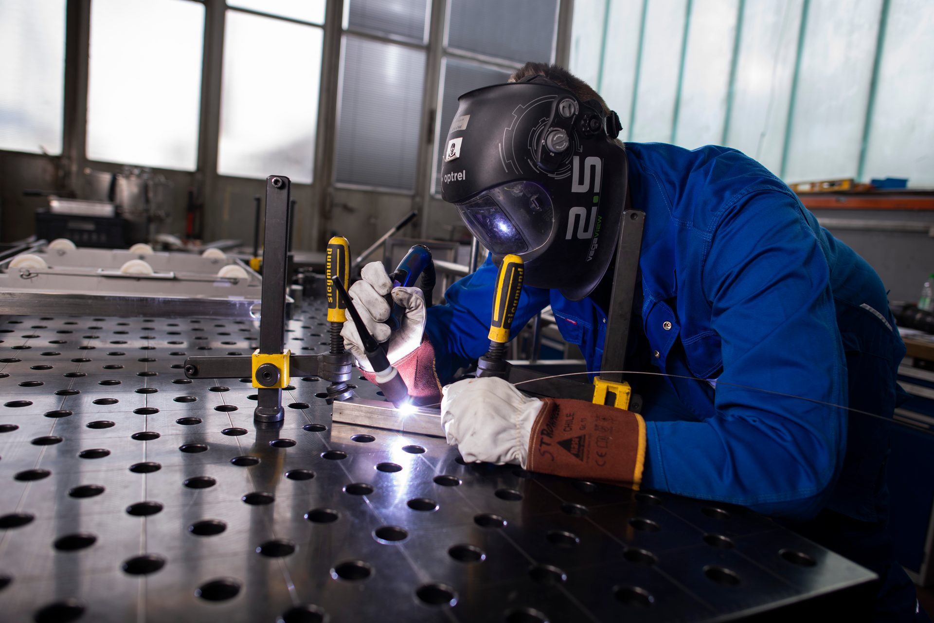 Personal protective equipment, Blue-collar worker, Safety Glove, Workwear, Welding, Metalworking, Helmet, Machine, Welder