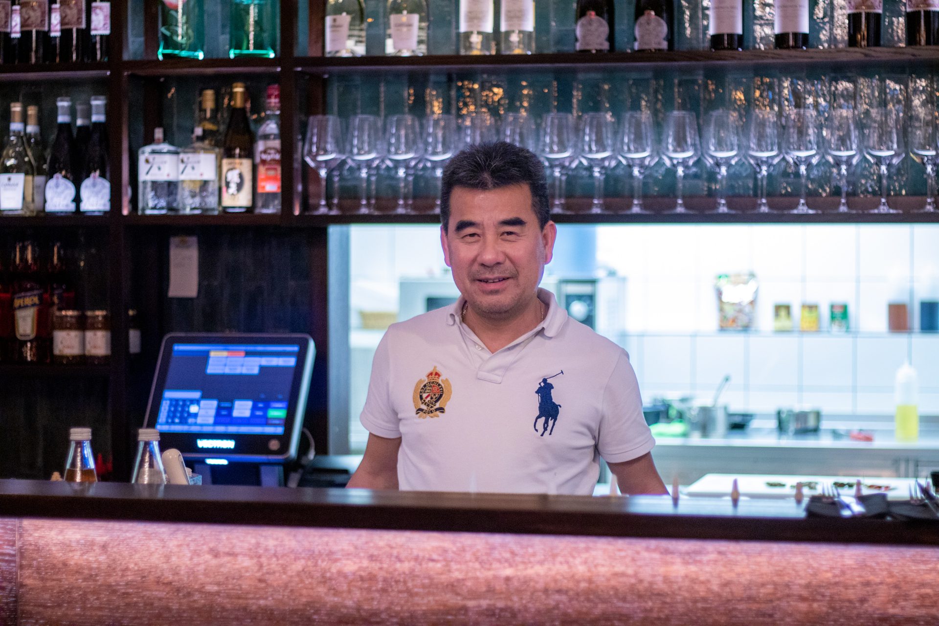 Drinking establishment, Alcoholic beverage, Smile, Bottle, Barware, Shelf