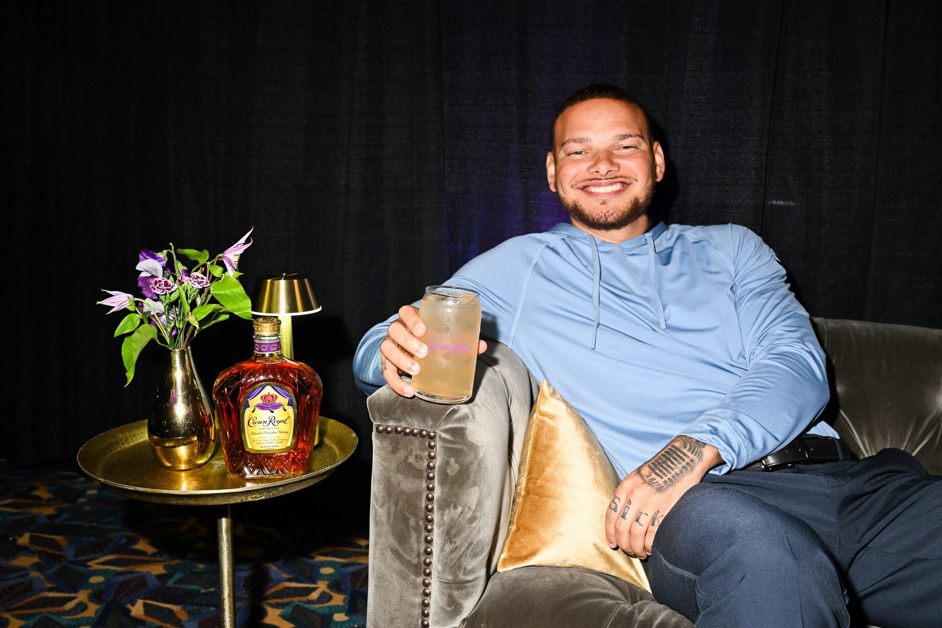 Flash photography, Smile, Furniture, Table, Plant, Drinkware, Tableware, Comfort