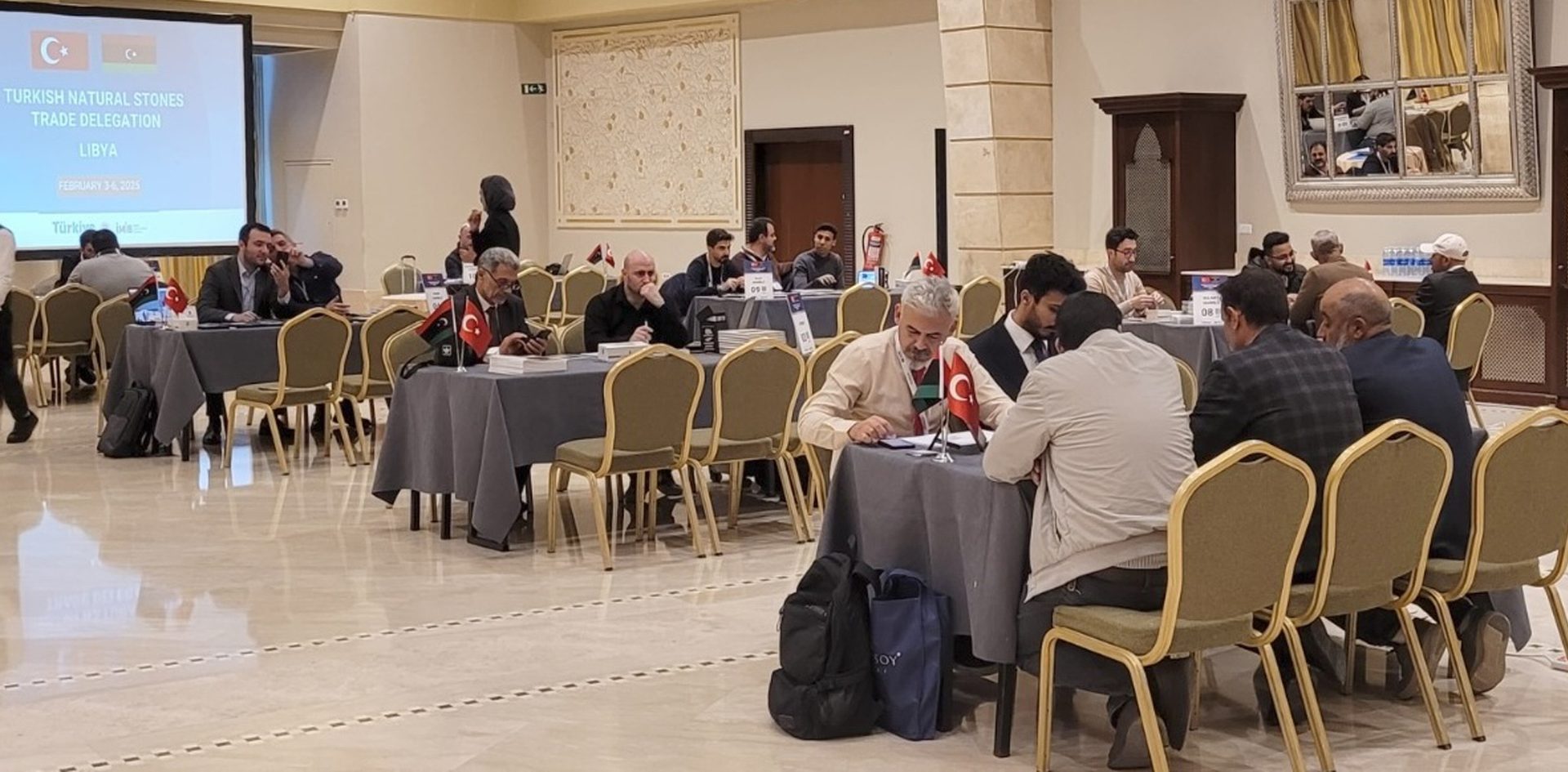 Interior design, Conference hall, Furniture, Chair, Event, Crowd, Suit, Ceiling, Meeting