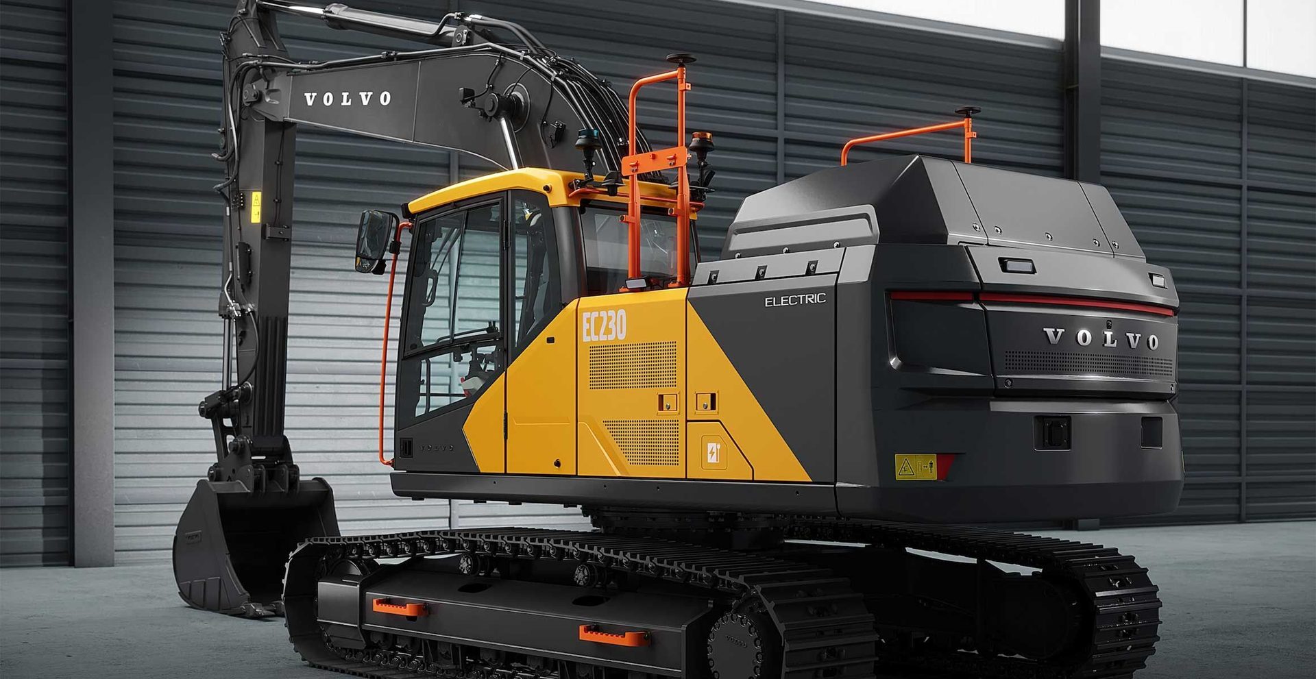 Volvo EC230 electric excavator in gray and yellow.