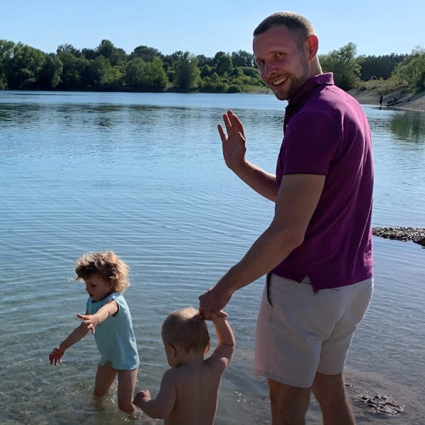 People in nature, Water, Shorts, Arm, Sky, Muscle, Leg, Lake, Standing, Tree