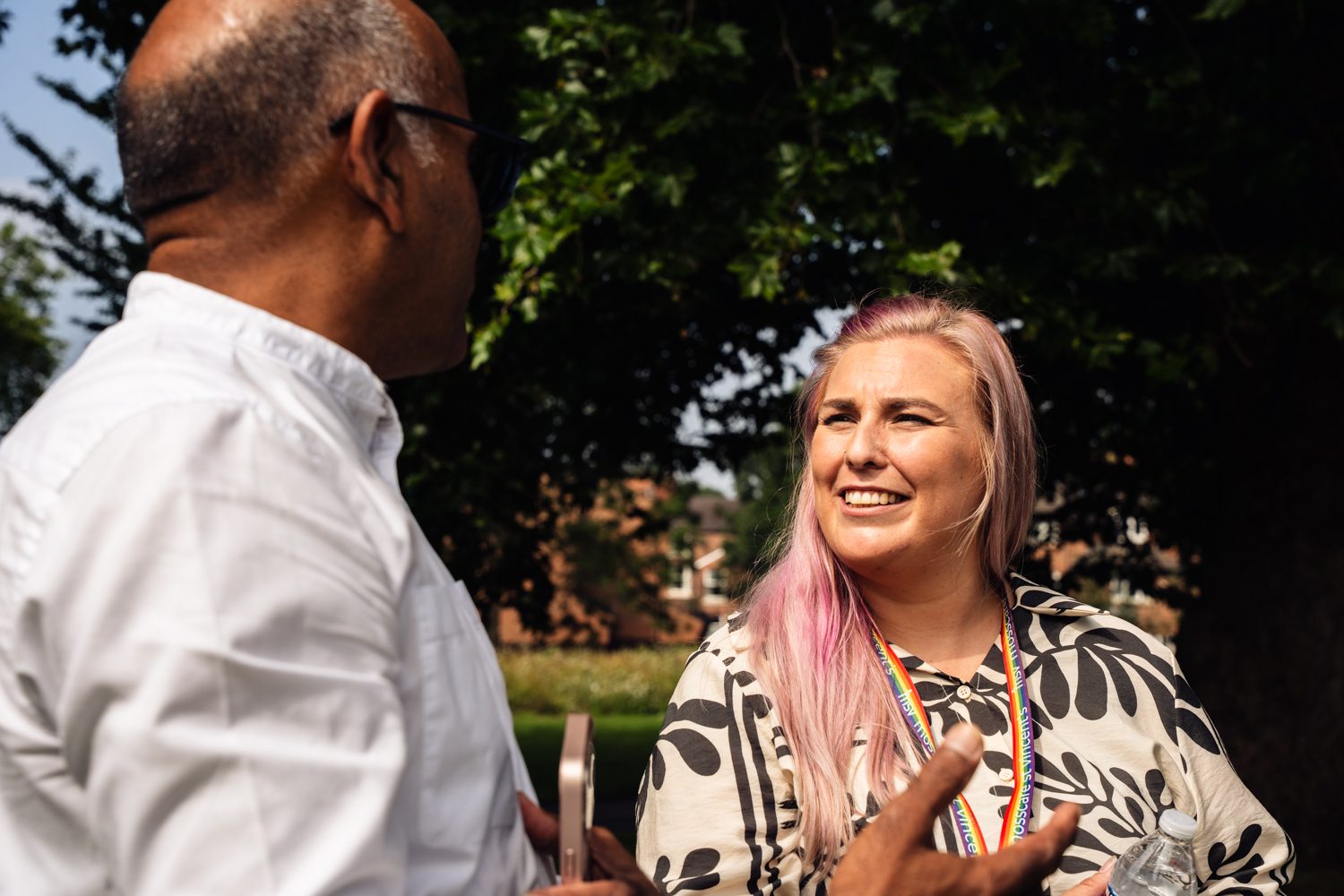 Photo of msv staff member smiling and talking to local resident