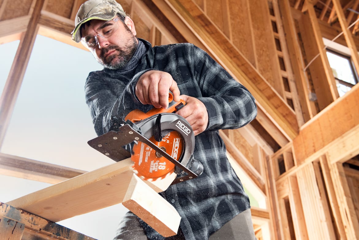 Guitar accessory, String instrument, Chainsaw, Tradesman, Workwear, Wood, Orange, Helmet, Musician