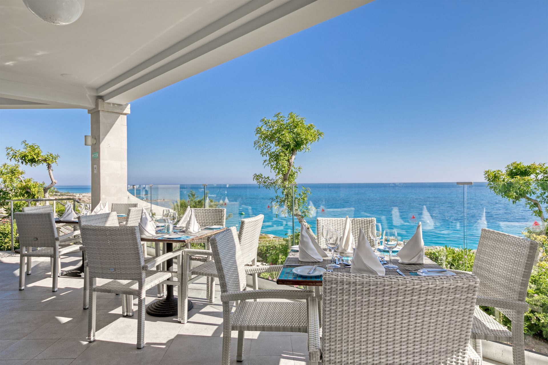 Outdoor furniture, Water, Sky, Building, Plant, Chair, Table, Azure, Tree