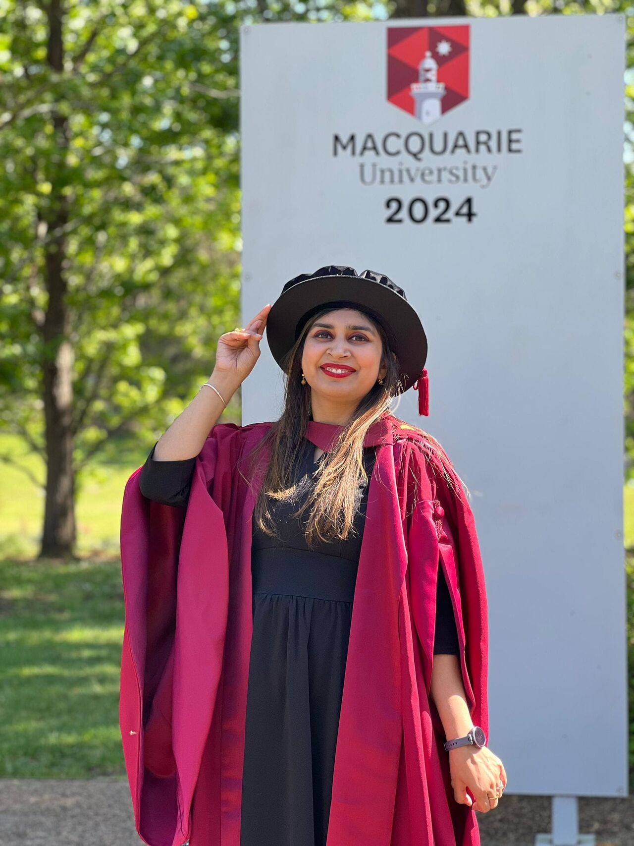 Academic dress, Graduation ceremony, Hat, Event, Headgear, Scholar, Smile, Happiness, Student, Costume