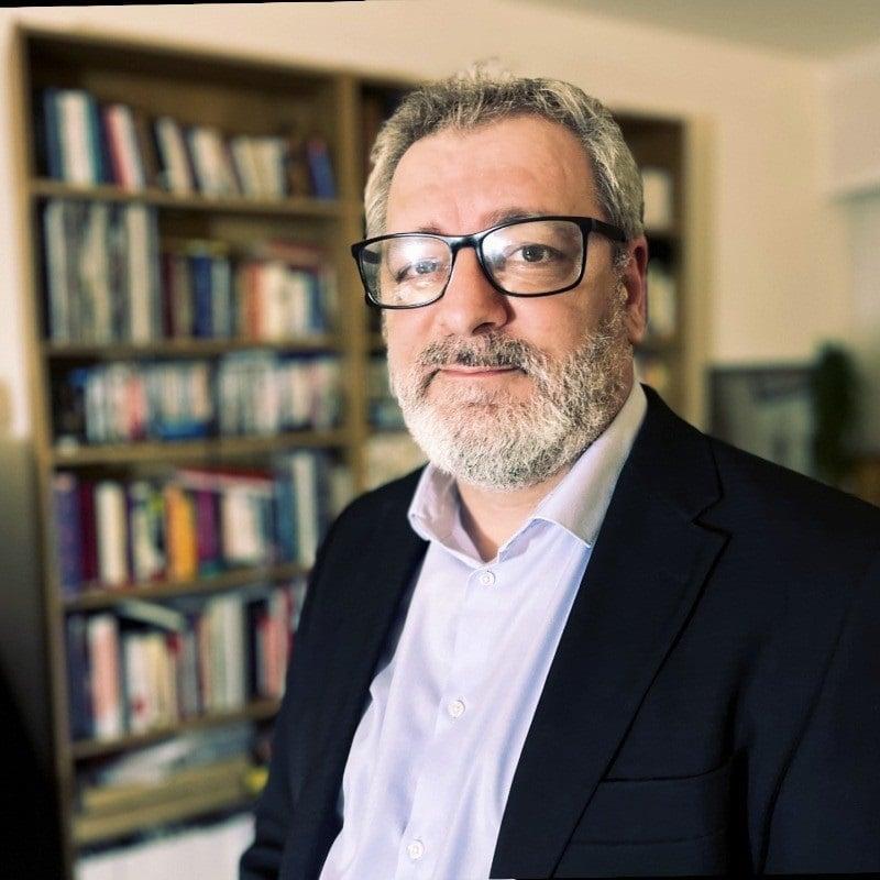 Vision Care, Facial hair, Eyewear, Chin, Glasses, Eyebrow, Face, Bookcase, Beard, Shelving