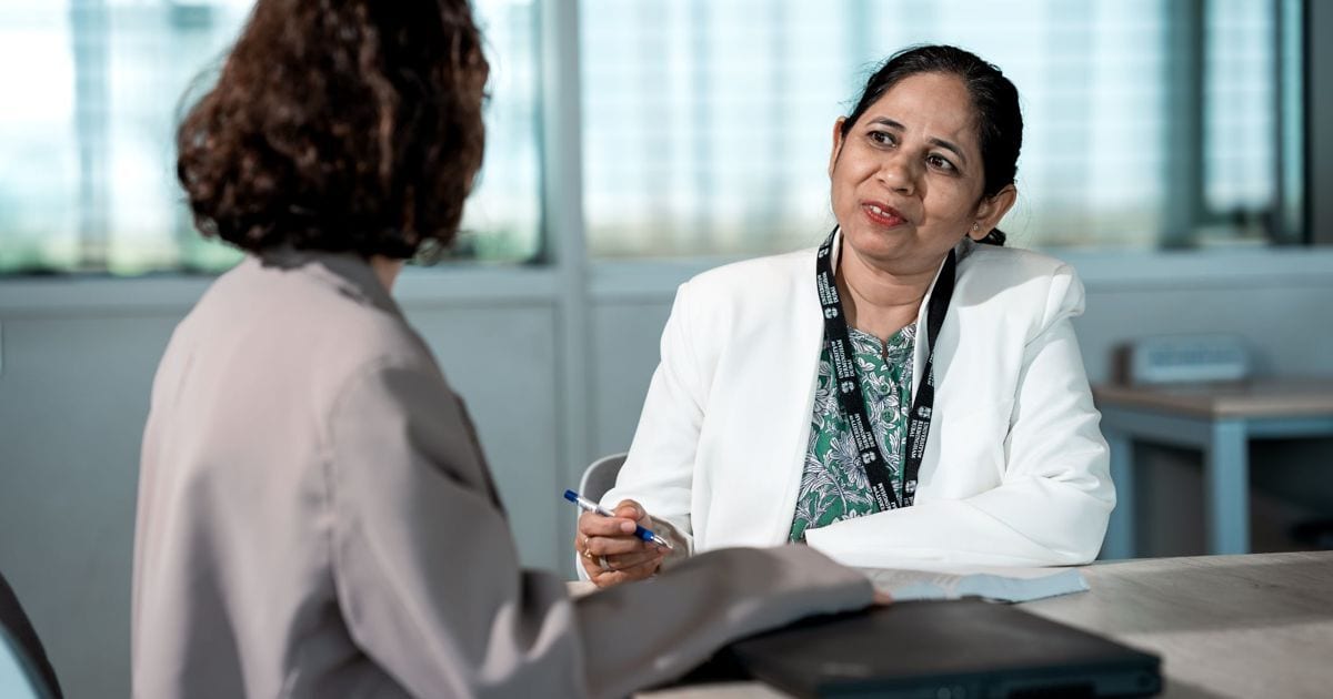 Two women in a meeting.
