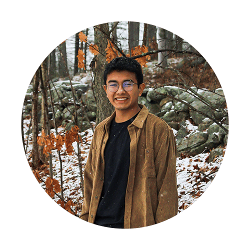 Glasses, Brown, Smile, Outerwear, Plant, Branch, Wood, Sleeve, Tree, Collar