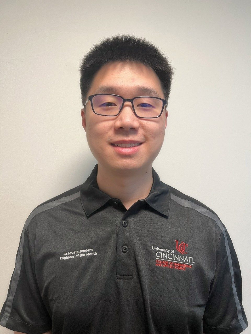Polo shirt, Vision care, Forehead, Glasses, Smile, Chin, Sleeve, Collar, Eyewear