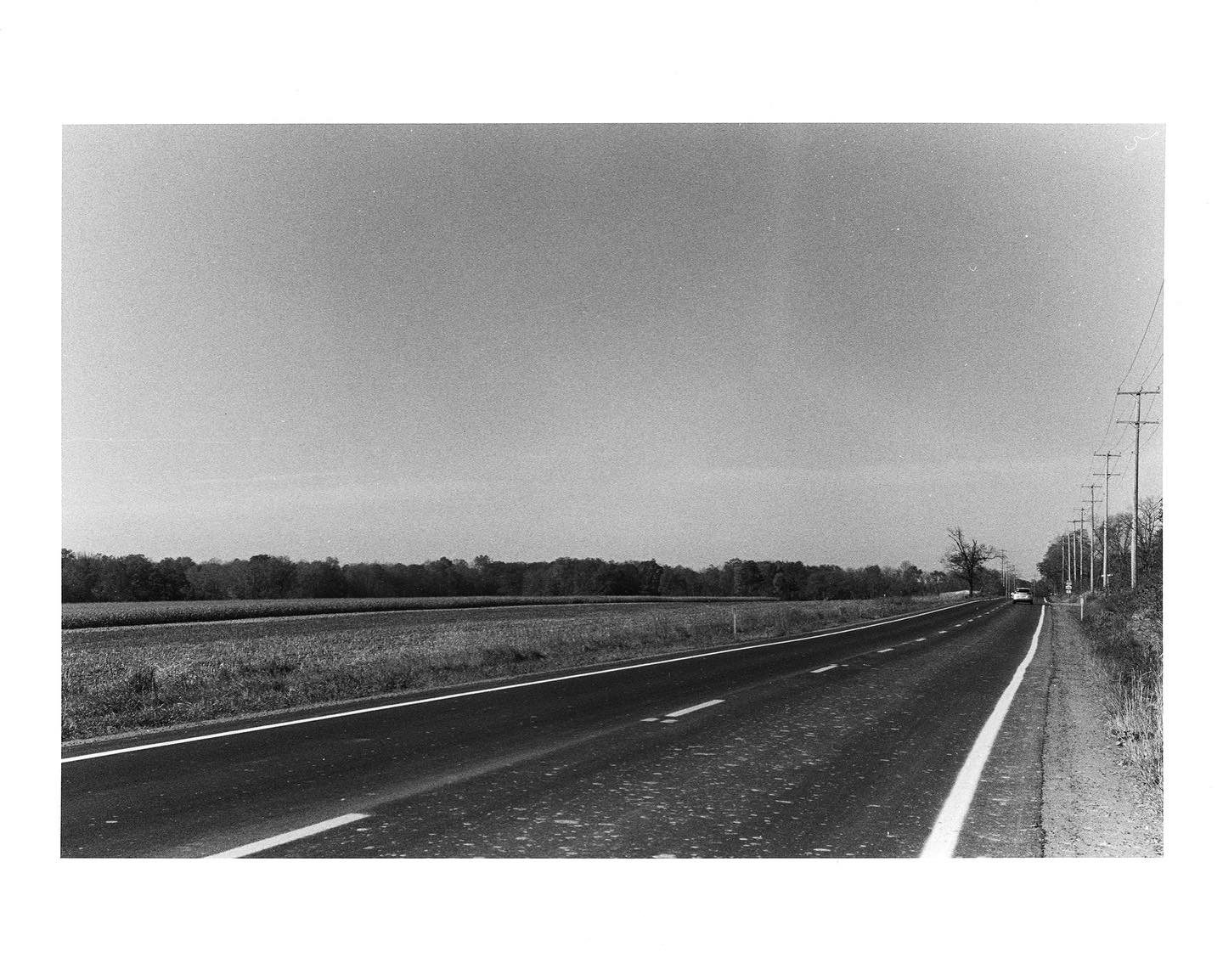 Road surface, Natural landscape, Sky, Cloud, Rectangle, Asphalt, Black-and-white