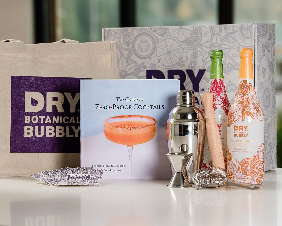 Interior design, Liquid, Perfume, Bottle, Drinkware, Product, Orange, Fluid, Tableware, Drink
