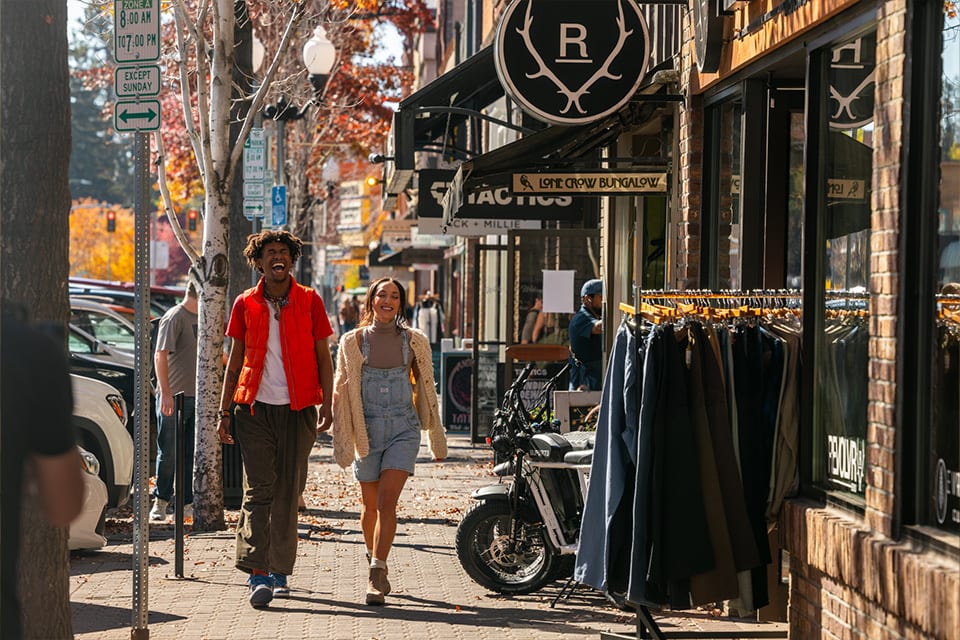 Young couple walking in downtown Bend
